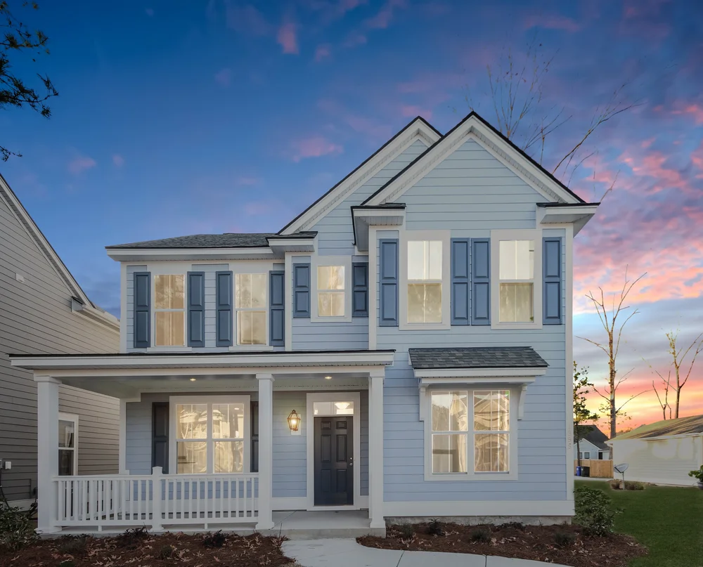 Same home transformed to glowing dusk with virtual twilight
