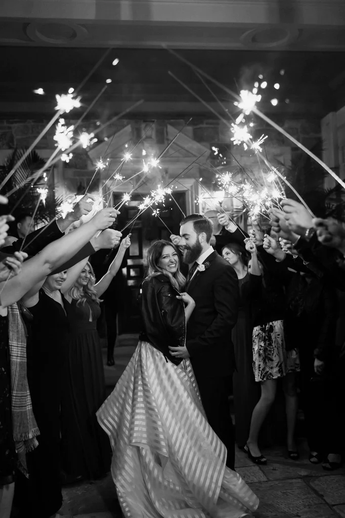 A wedding featuring fireworks and a romantic setting.
