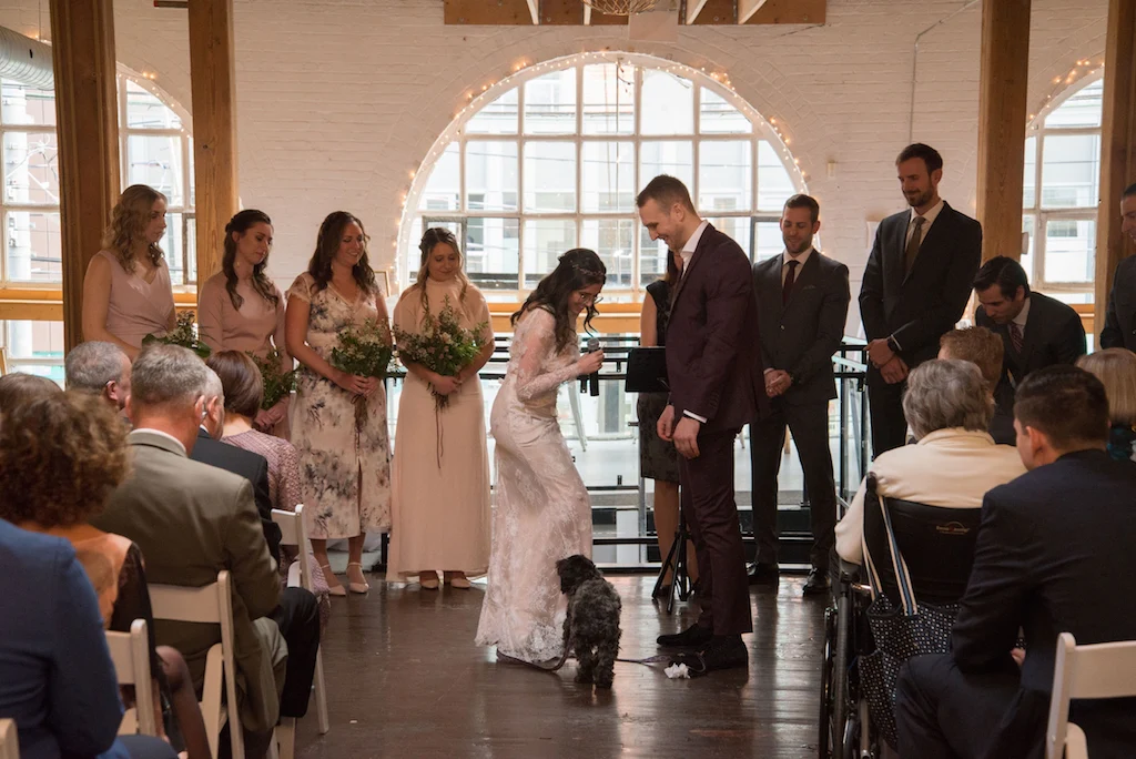 A young couple getting hitched inside Toronto's Twisted Gallery on Queen West.