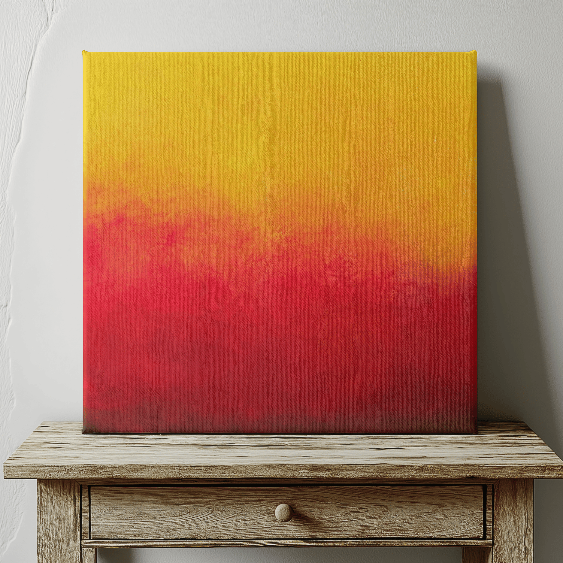 A minimalist image featuring the vibrant Rising Heat original painting resting on a table.