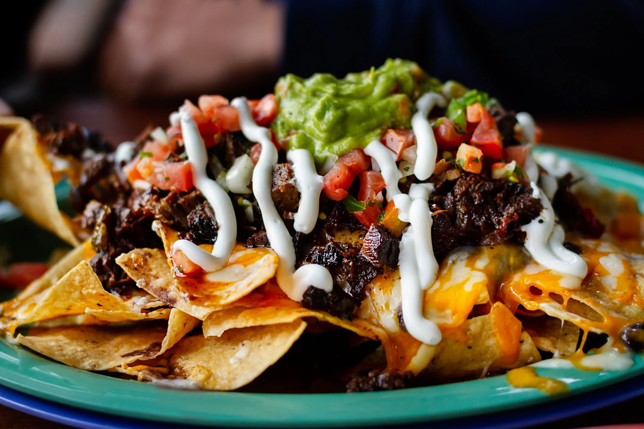 Piled-high-nachos-at-Flaming-Amys-Burrito-Barn.jpg