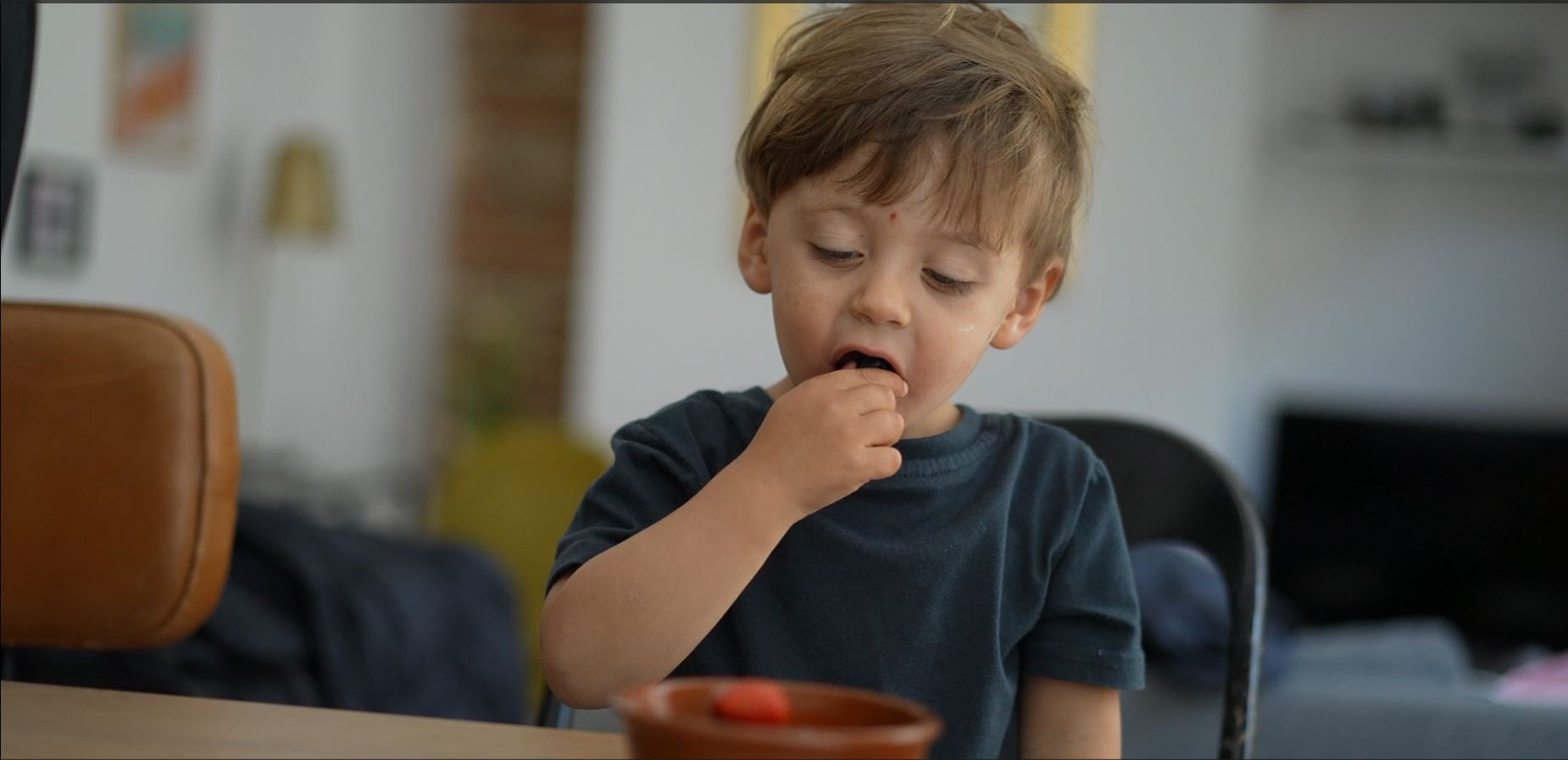 boy with fruit still.JPG
