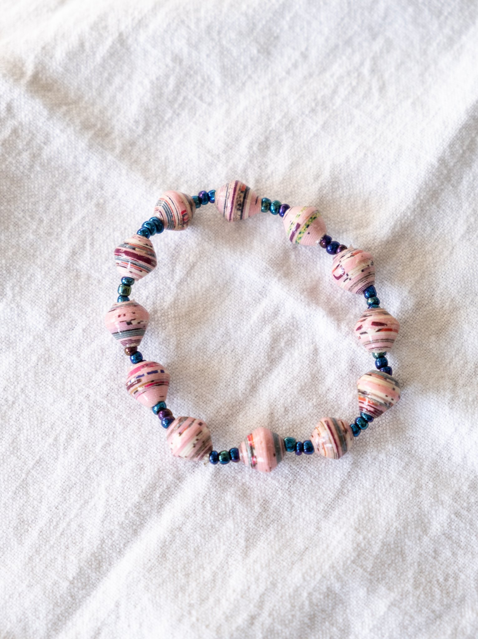 How to Make Bracelets With Beads Made Out of Paper