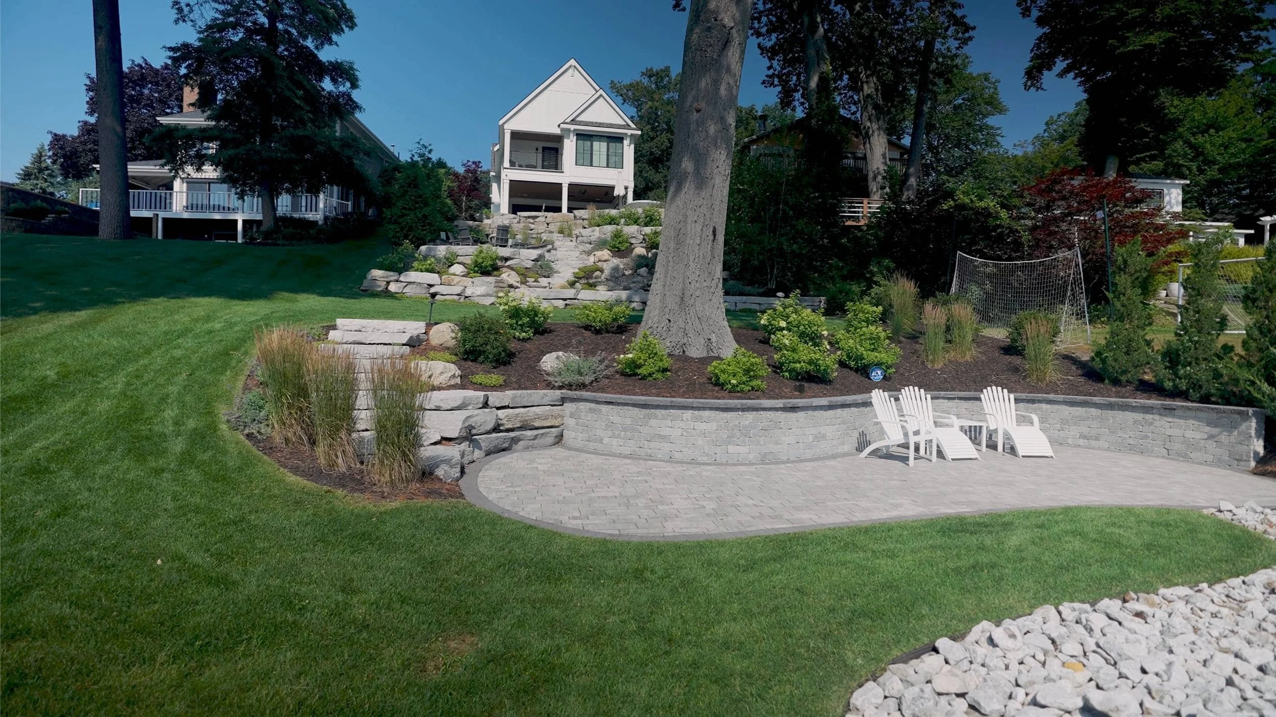 Fire Pit Patio With Scenic Water Views in East Grand Rapids, MI
