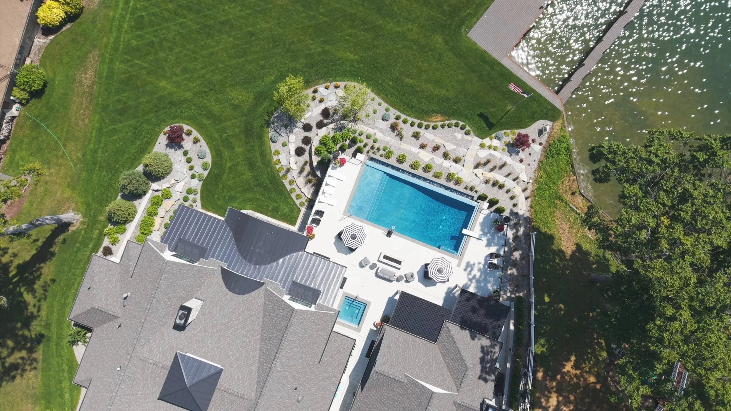 Backyard Paver Patio With Scenic Water Views in Grand Haven, MI