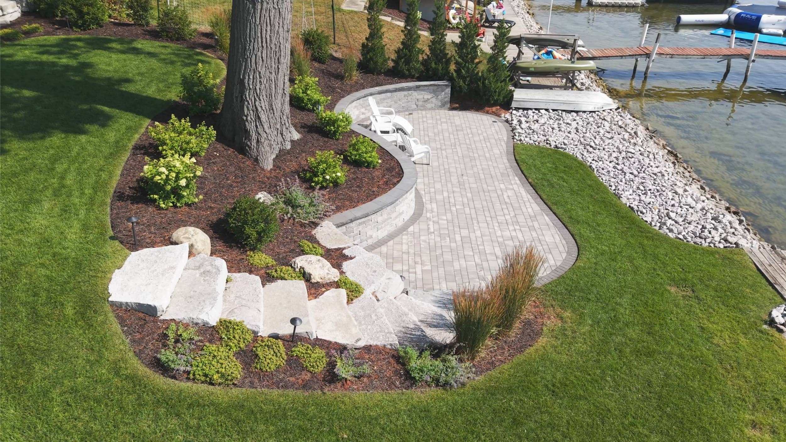 Backyard Fire Pit Near Multi-Level Retaining Walls in East Grand Rapids, MI