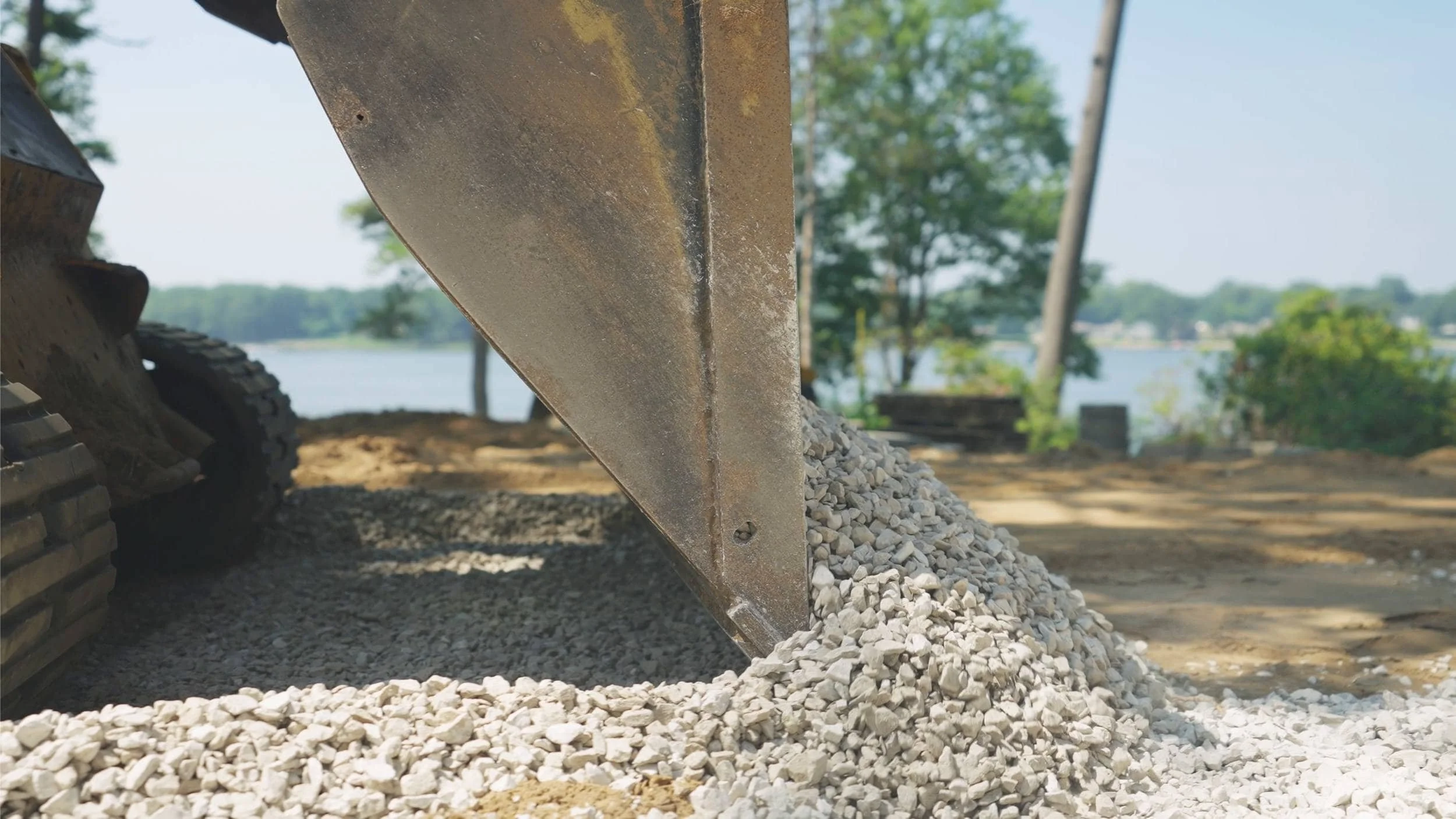 Custom Landscape Design With Stone Retaining Wall in Port Sheldon, MI