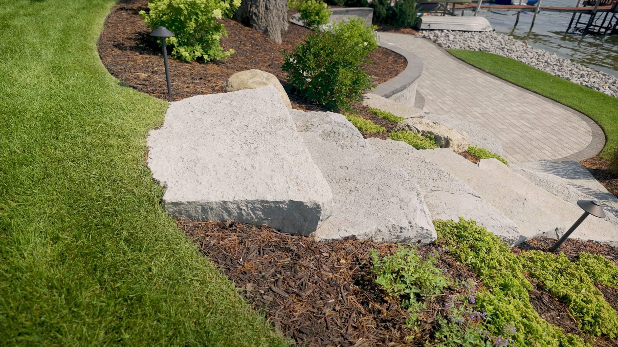 Hot Tub Patio With Natural Stone Surround in Cascade, MI