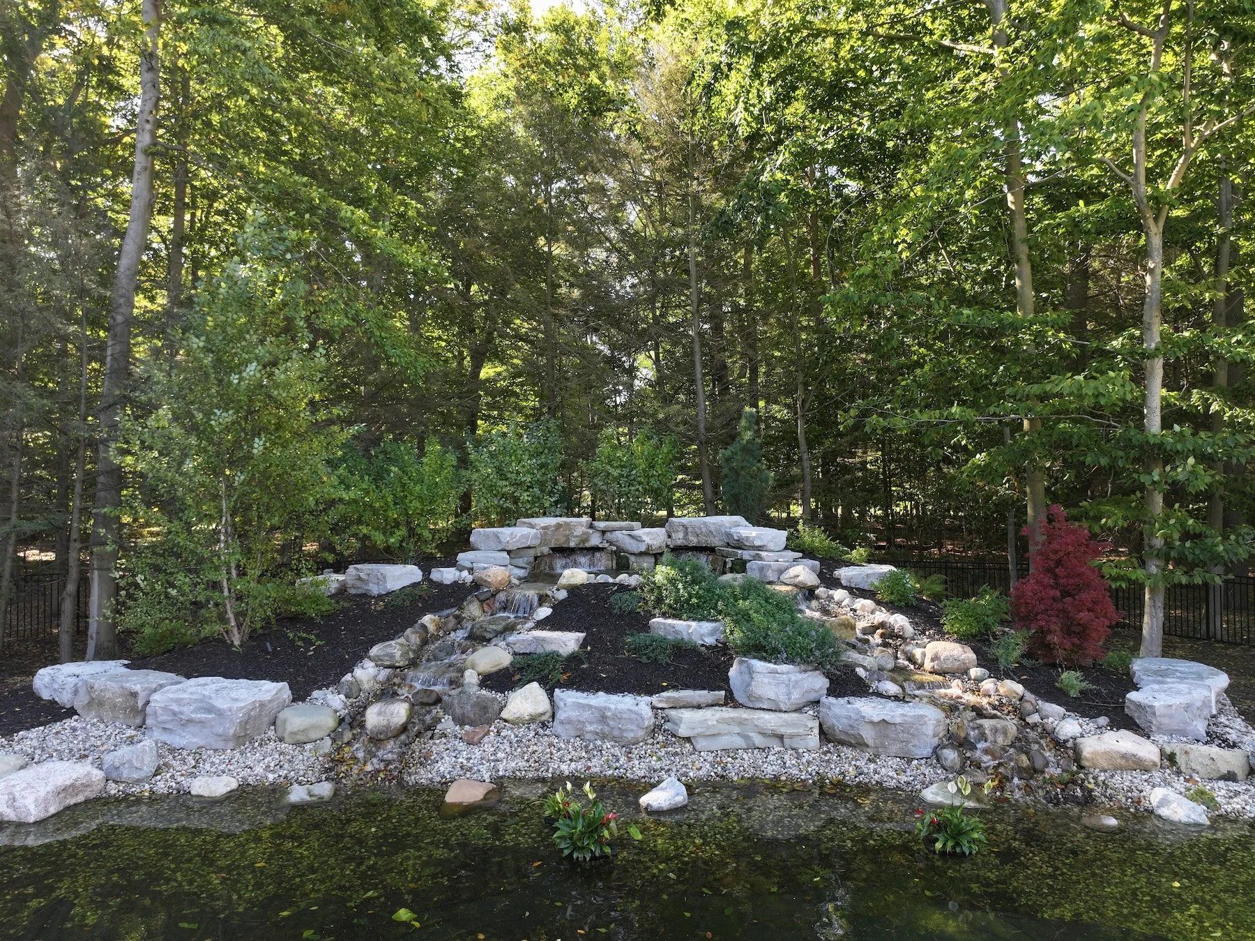 Woodland-inspired plantings with seasonal color in Holland, MI