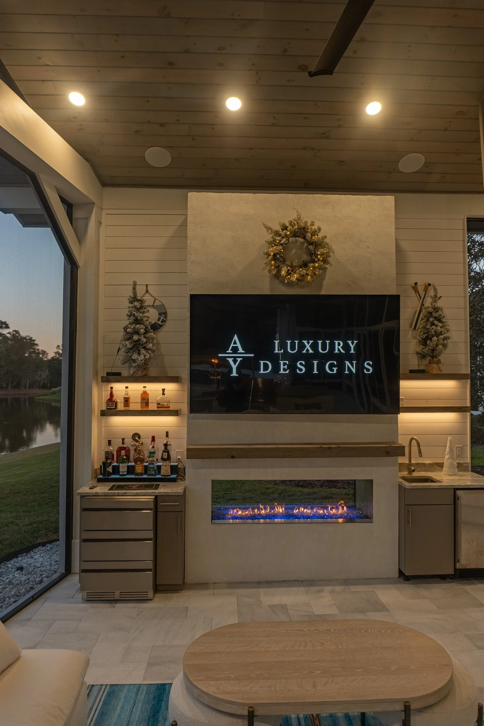 Linear gas fireplace under a tongue-and-groove cedar gazebo ceiling in Ponte Vedra Beach