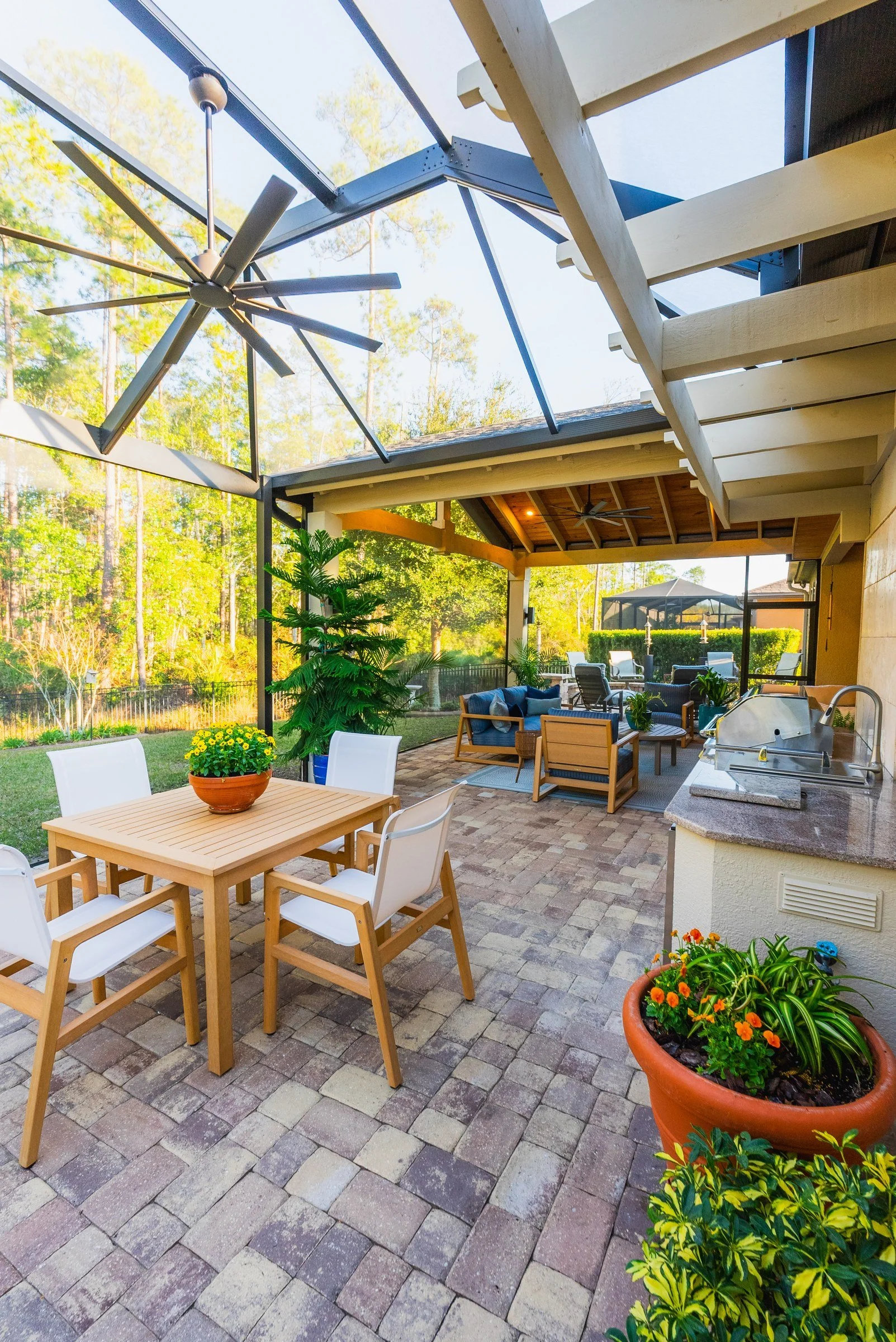 Screened patio with cedar trellis and paver dining area, Del Webb Ponte Vedra