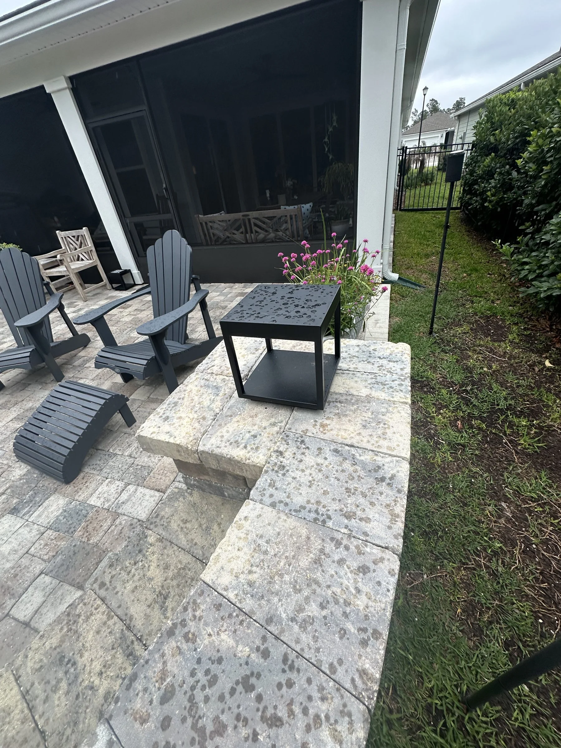 Paver patio extension and bench off a screened lanai, Nocatee FL