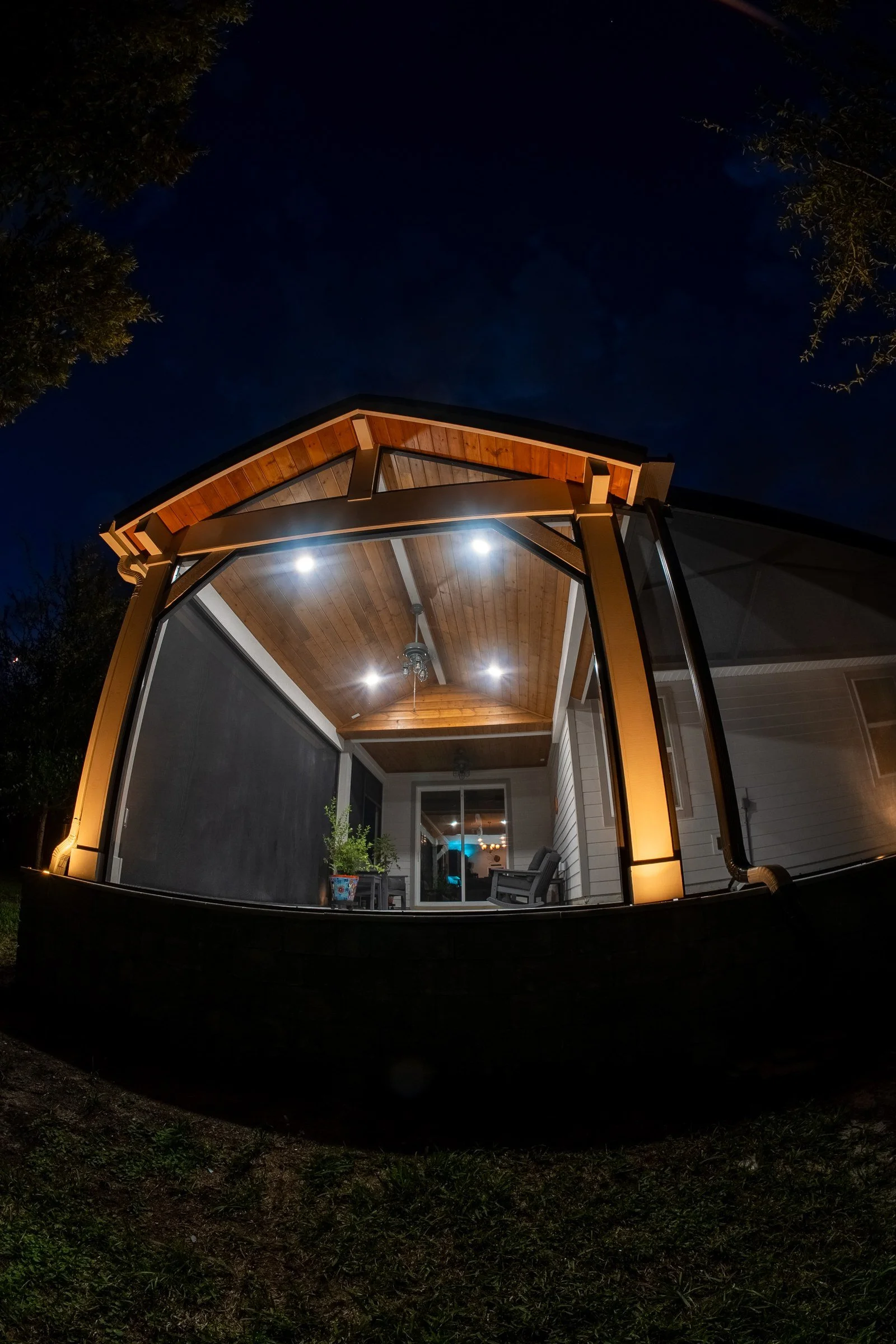 Insulated-roof cedar gazebo at night, SilverLeaf, St. Augustine