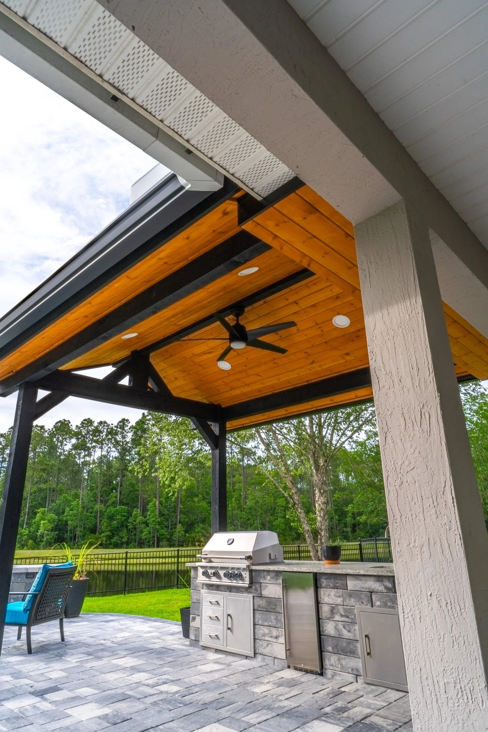 Outdoor kitchen under an A-frame cedar gazebo in Durbin Crossing, St. Johns FL