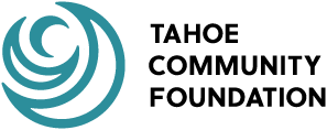 Abstract swirling logo in shades of blue and black for Tahoe Community Foundation.