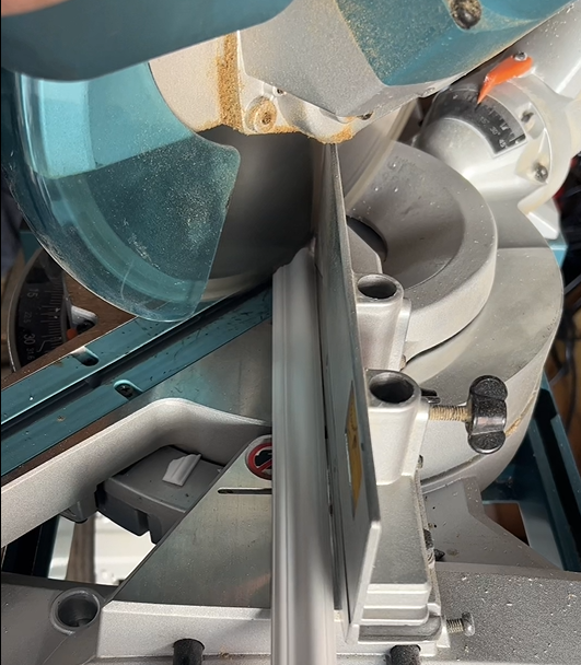 Cutting wall panelling with mitre saw