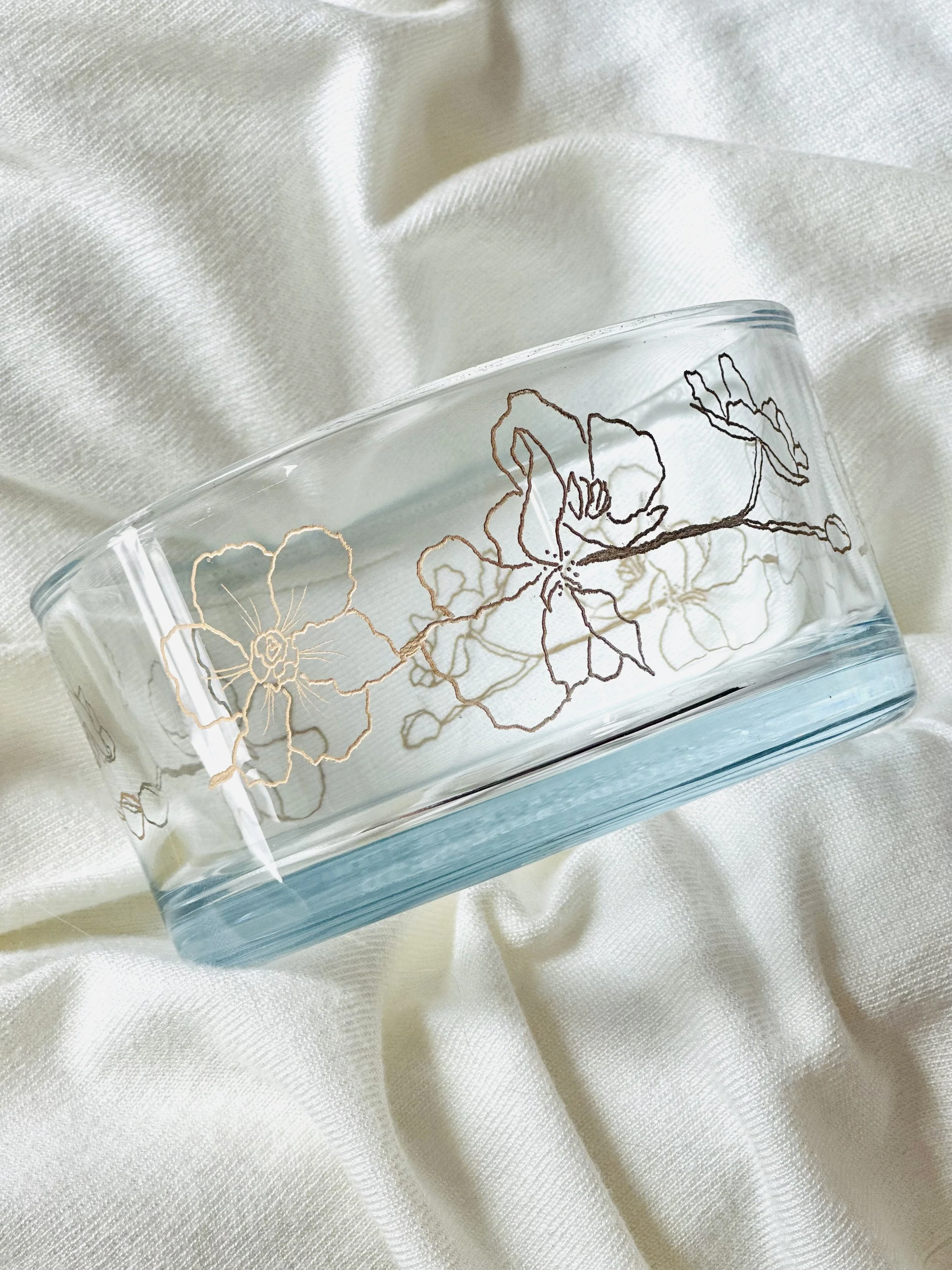 Glass dish custom engraved with a rose-gold floral design, live engraving by Lauriane Rognie in Los Angeles