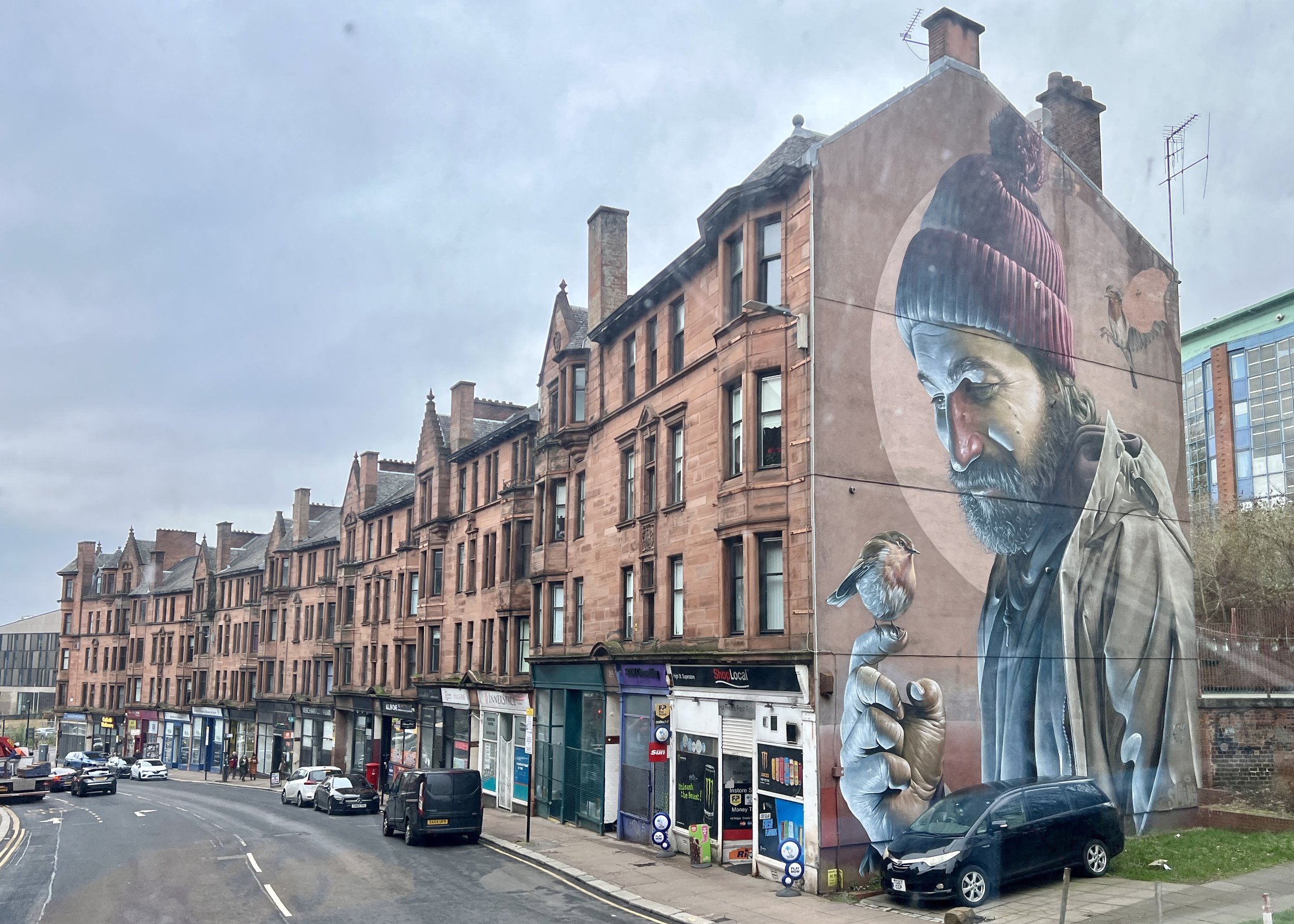 St. Mungo is a popular mural by Smug on the City Centre Mural Trail