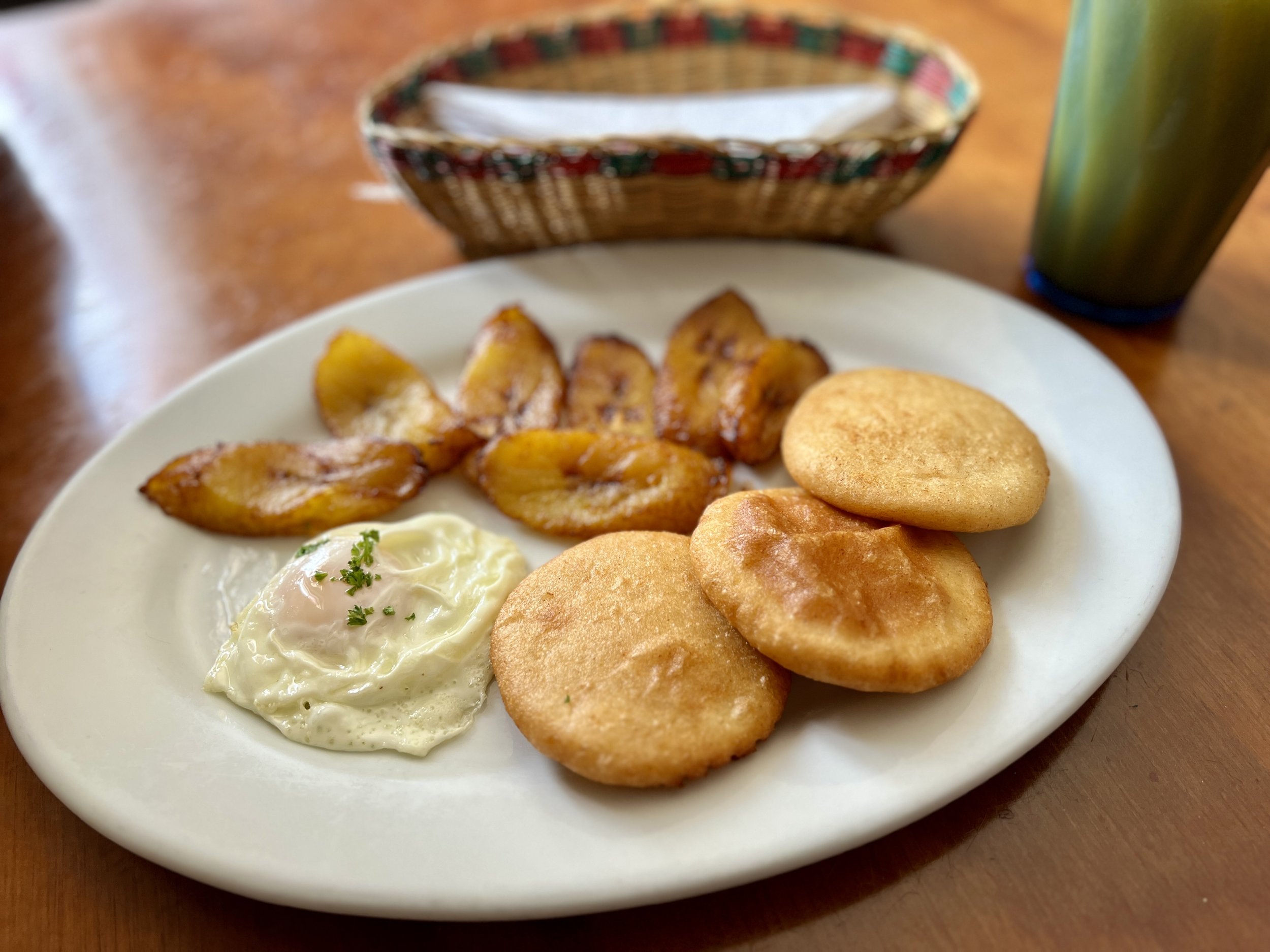 Arepas and plantains from New Pueblito Paisa CREDIT Jennifer Bain.jpg