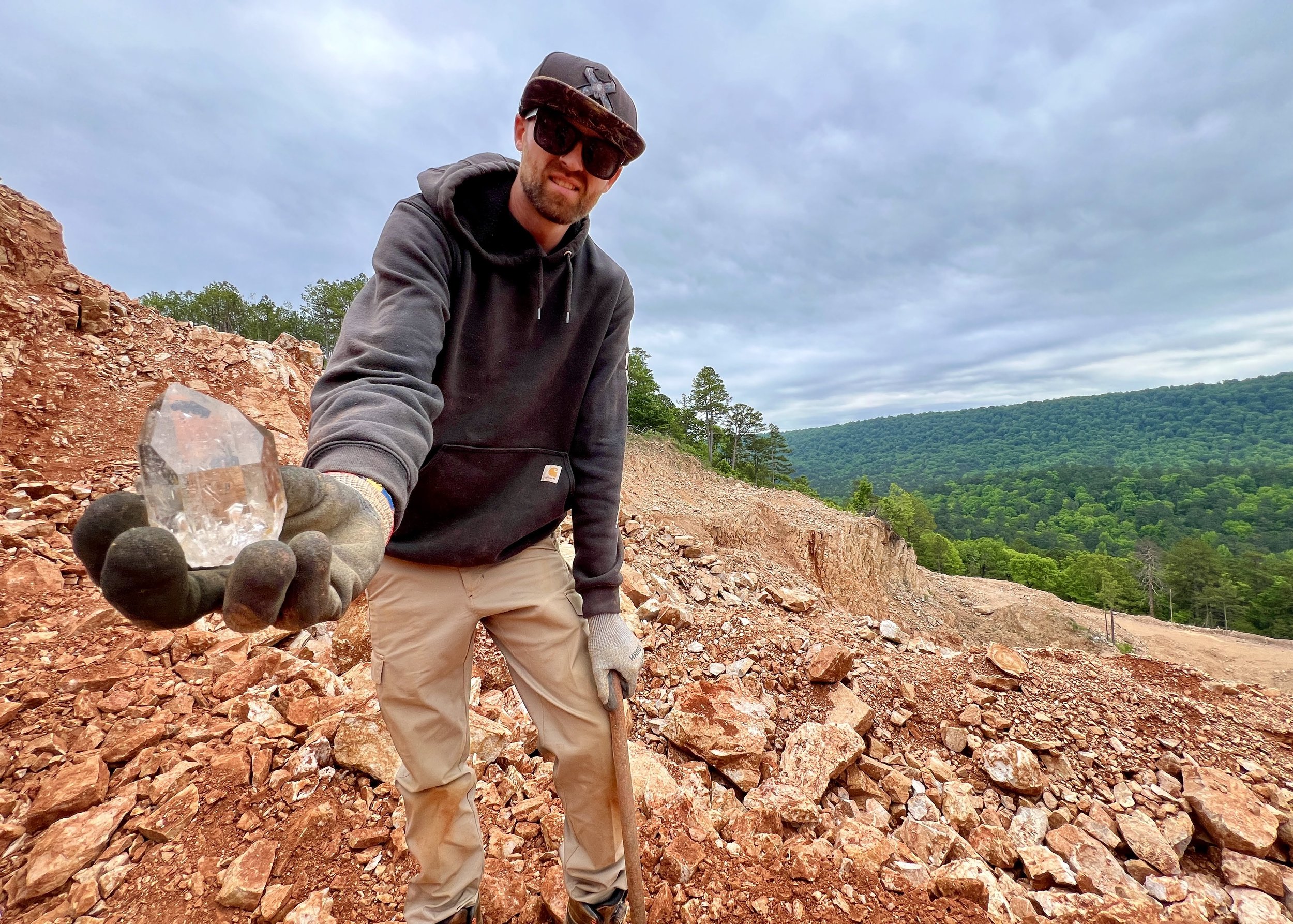Avant Mining miner Sam Alston with a quartz crystal CREDIT Jennifer Bain.JPG