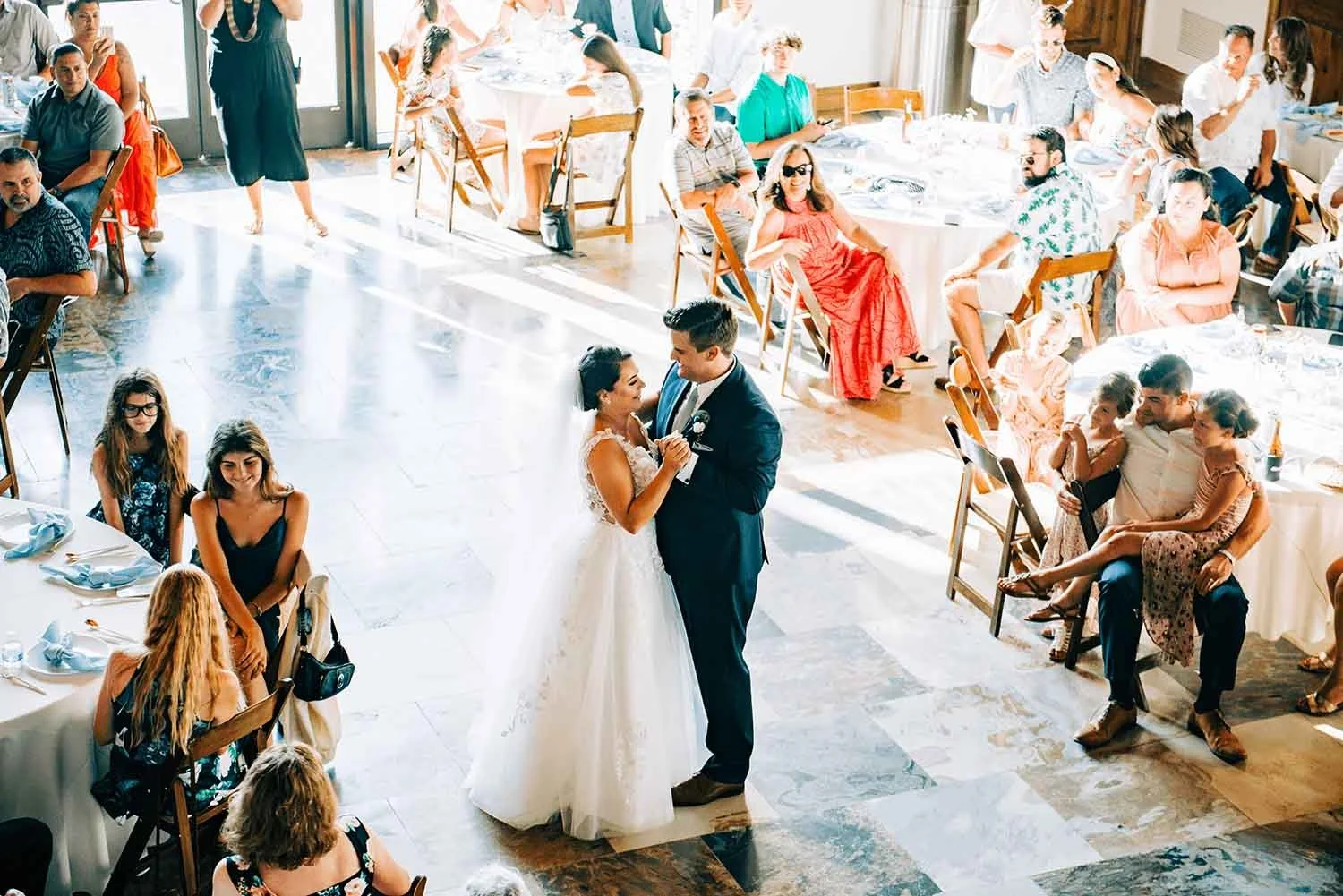 A bride and groom dancing on their wedding day at Launch Pointe wedding and events venue in Southern California.