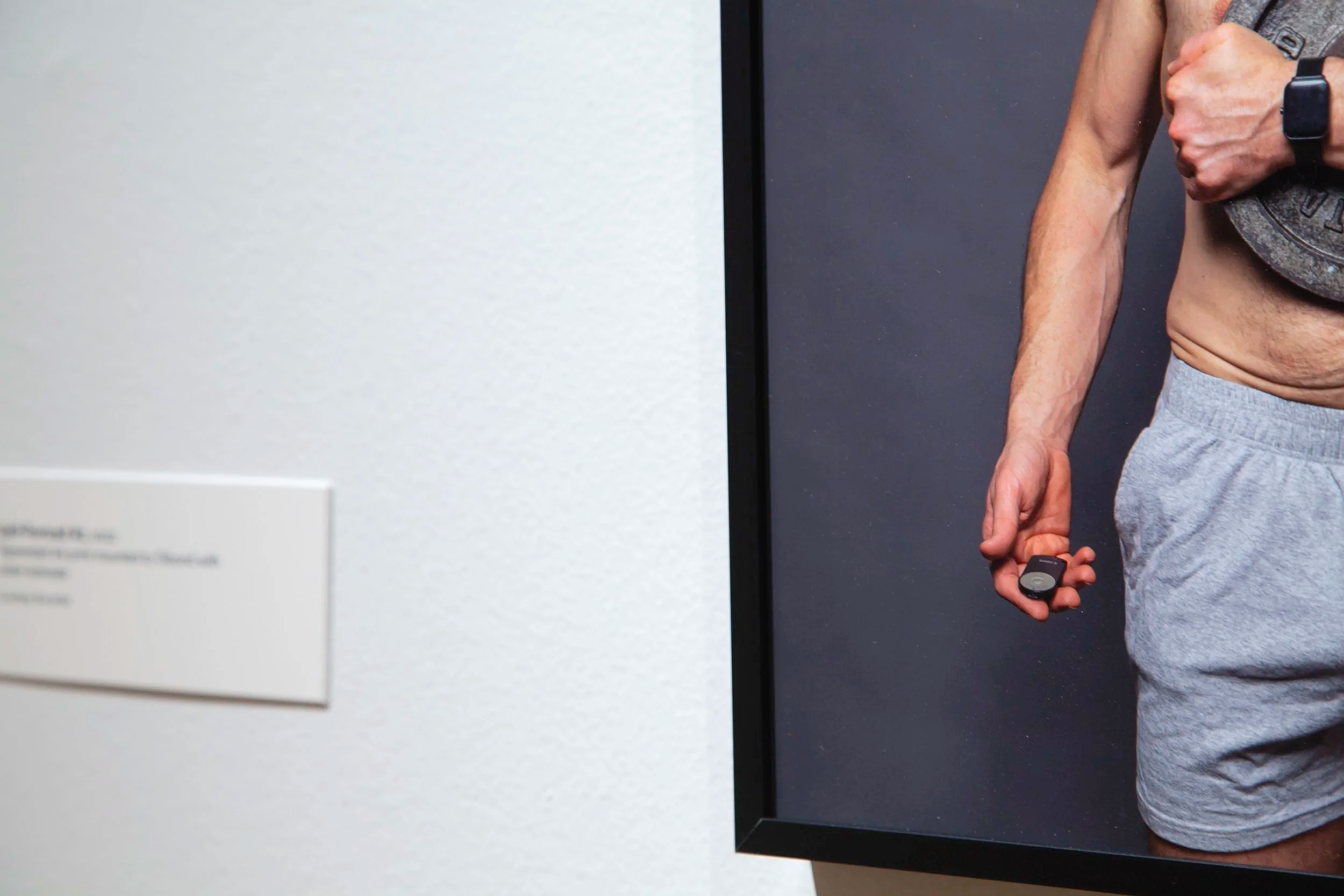 Detail of Self Portrait (Plate). 
Self timer in open hand of the artist.
Subtle low profile black matte frames made the work feel floated on the wall.