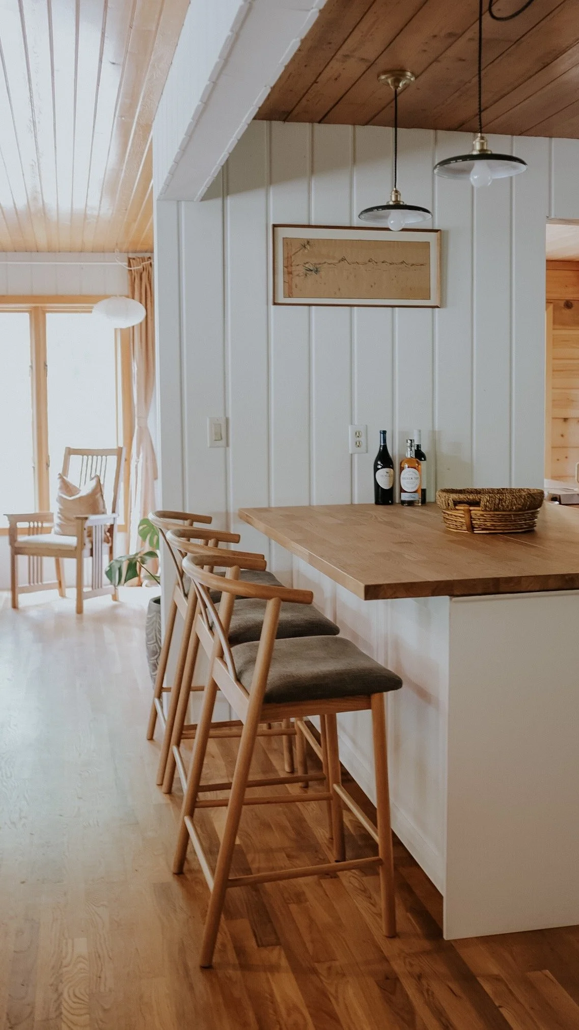 Warm wood-paneled interior of Deep Creek Farmstead's vacation home near Portland, Oregon.