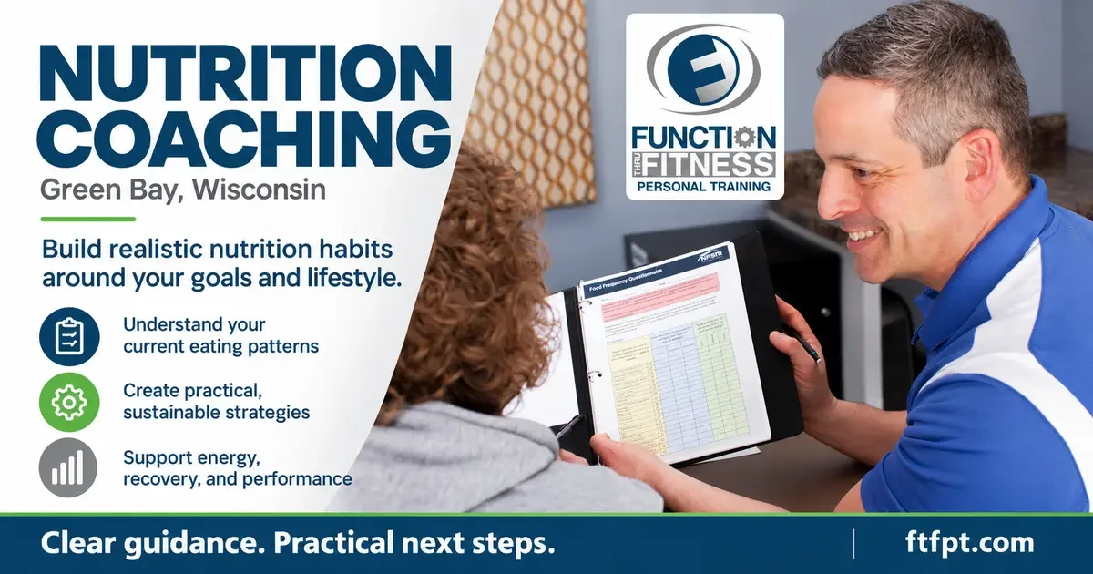 Nutrition coach reviews a personalized nutrition plan with a client at Function Thru Fitness.