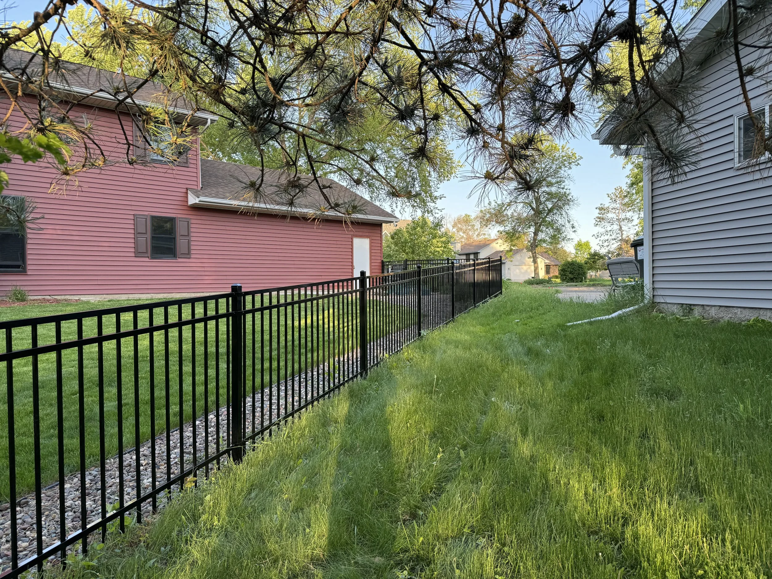 Ornamental fence near me in Forest Lake, MN enhancing property aesthetics