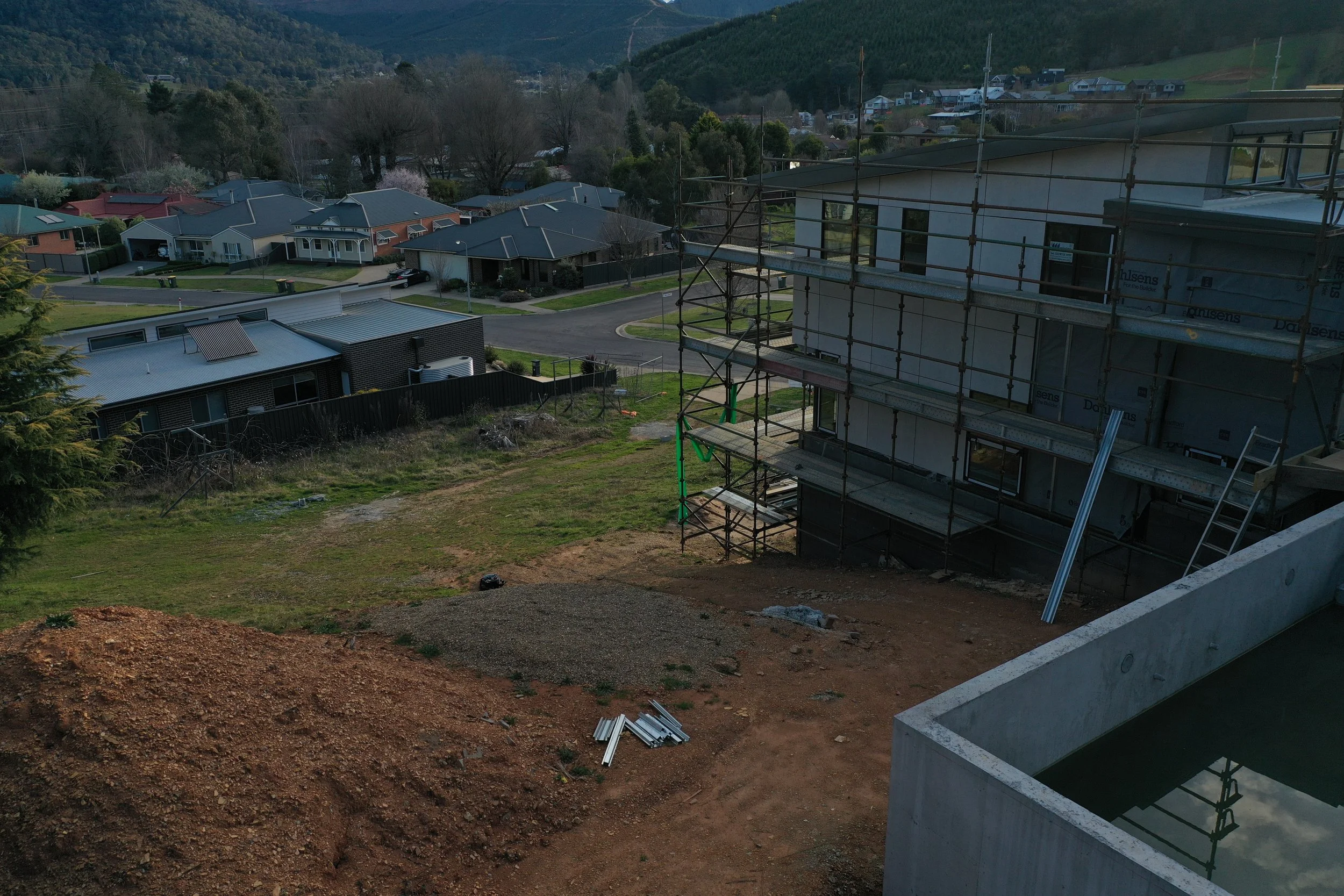 The rear of the property, requiring significant excavation and retaining to achieve functional landscape spaces