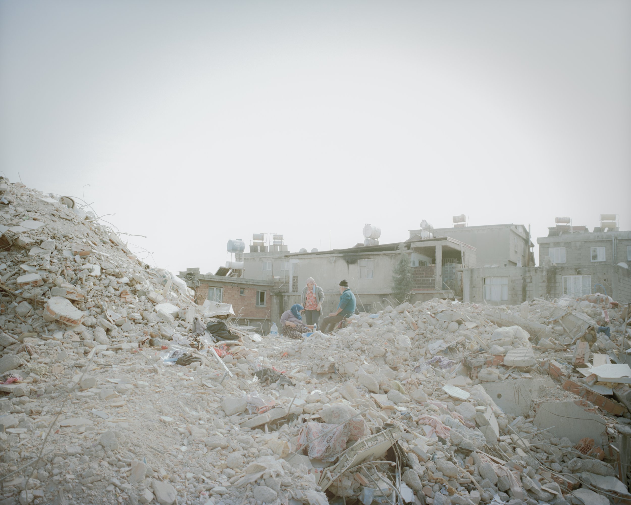 The people who rest on the rubble.