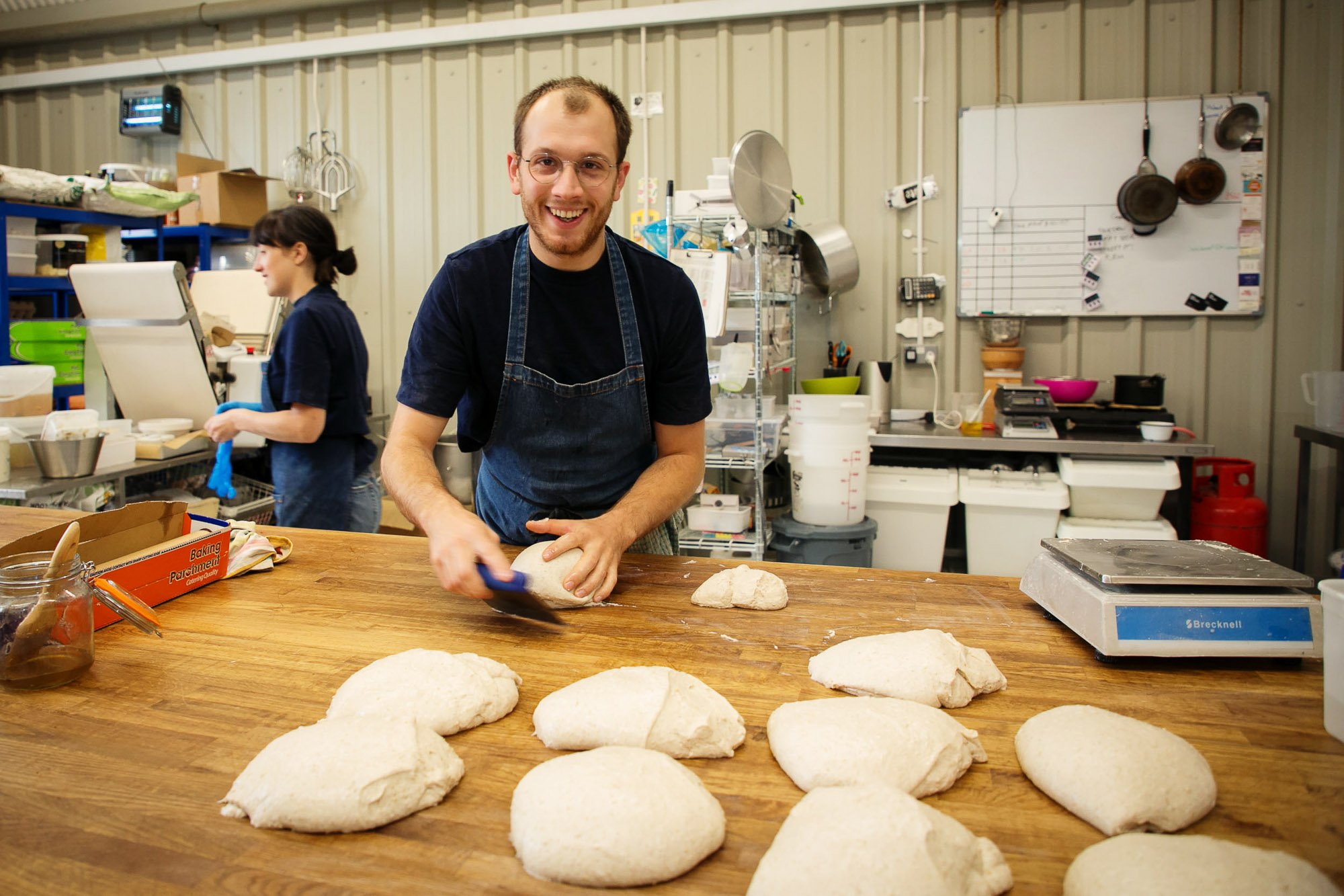 Baker preparing bread dough.jpg
