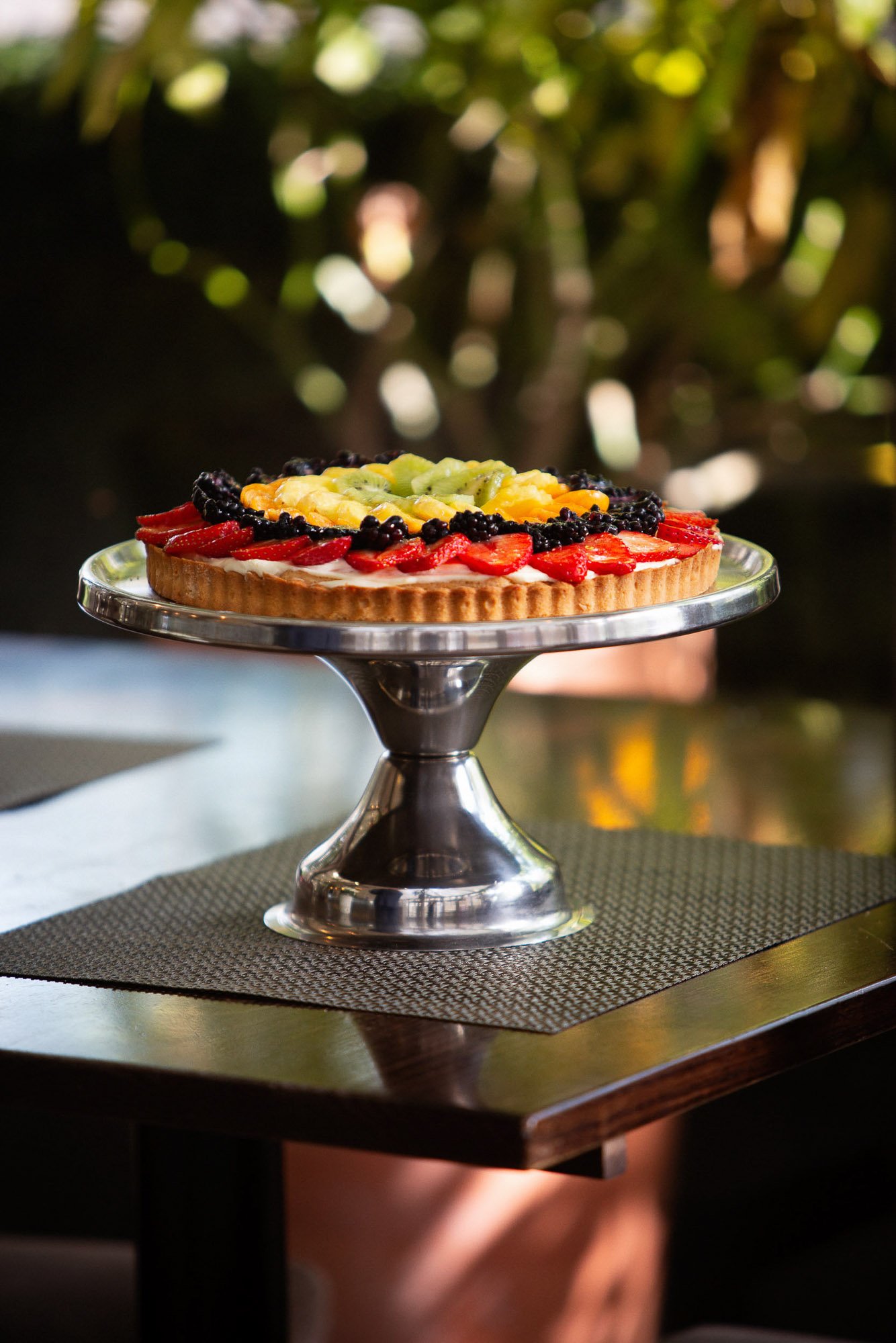 Fruit tart on a dispaly stand.jpg