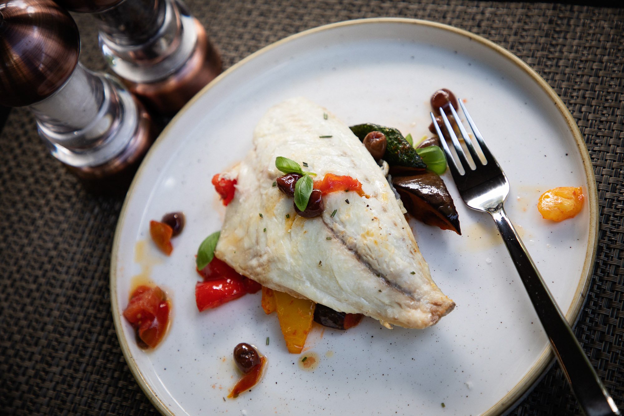 Fillet of white fish with peppers and tomatoe.jpg