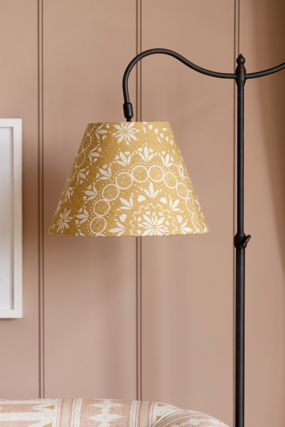 A lamp shade covered in fabric from the Aventuras Collection by designer Zoe Glencross.jpg