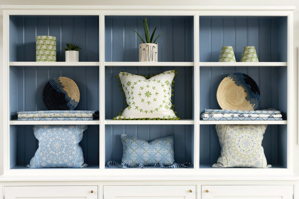 Shelves featuring soft furnishings using fabric from the Aventuras Collection by designer Zoe Glencross.jpg