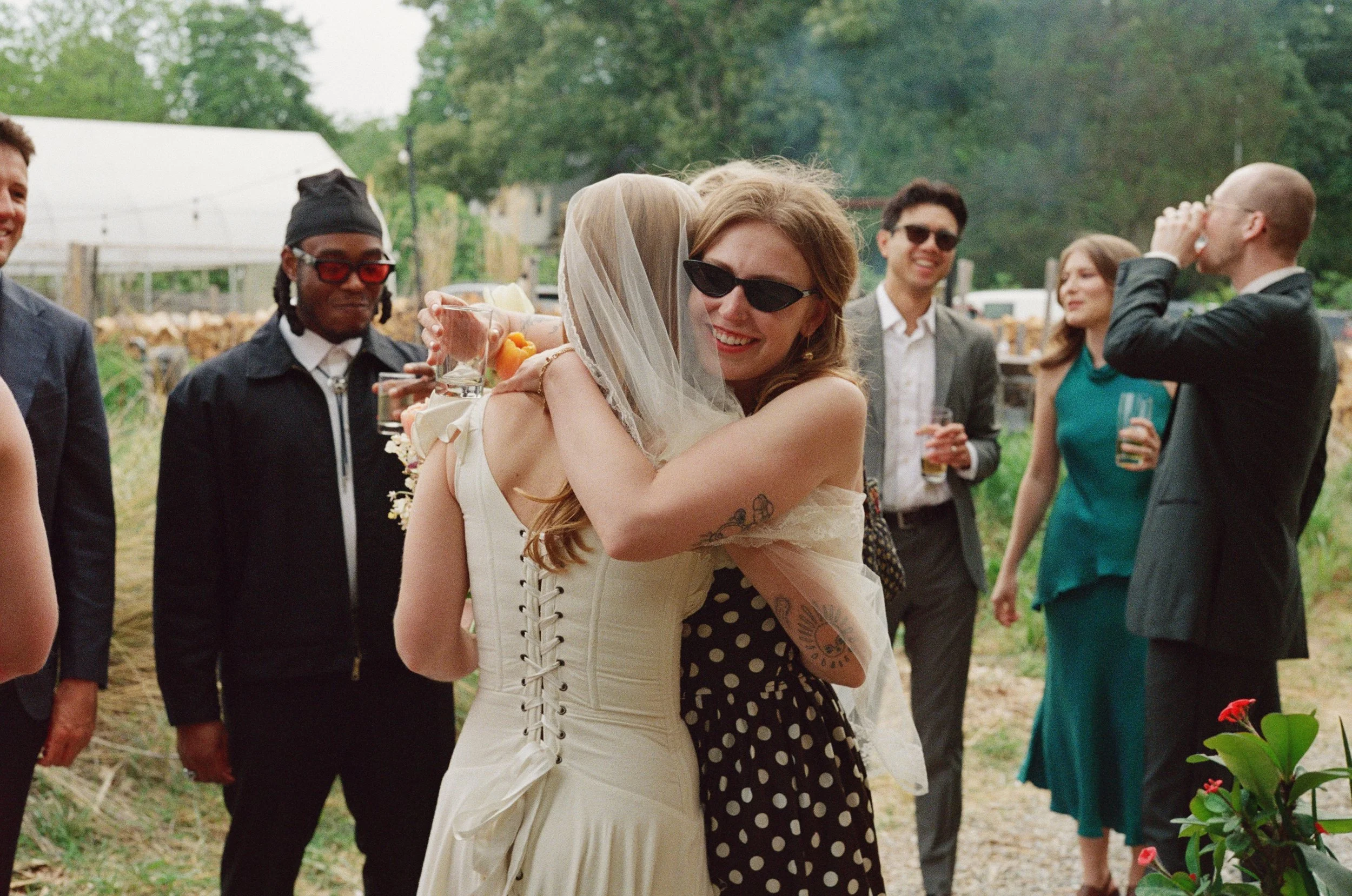 Genuine hug at small elopement wedding captured on film.
