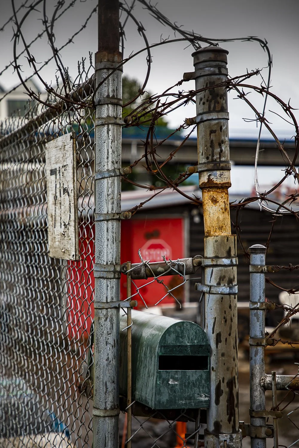 BARBWIRE FENCED HOME PHOTOGRAPH · Vancouver Canada