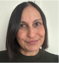 Head-and-shoulders photo of a Health Liaison Team member photographed indoors with ceiling lights visible in the background