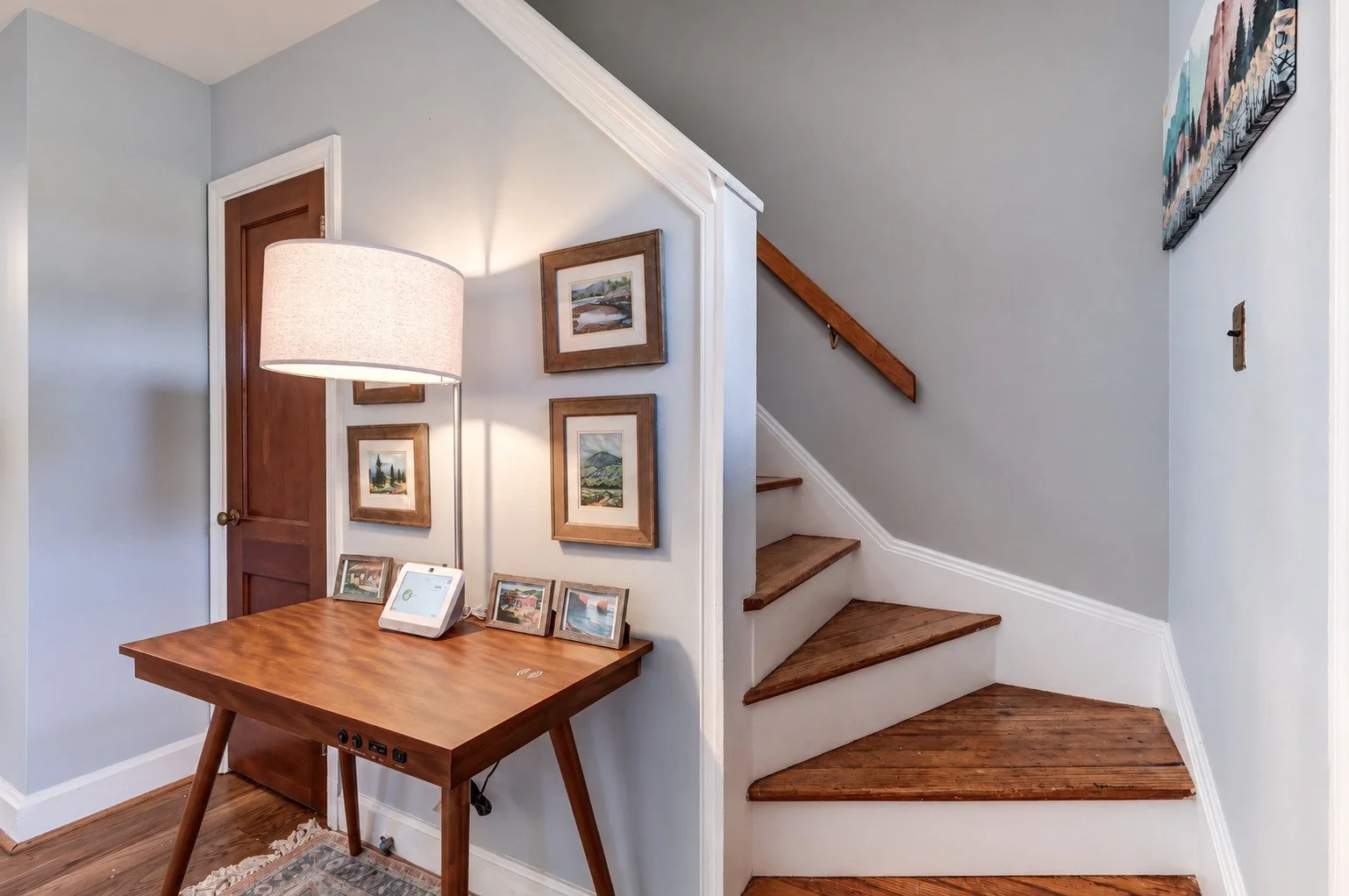 Cozy Mid-Century Entryway with Stairs.jpg