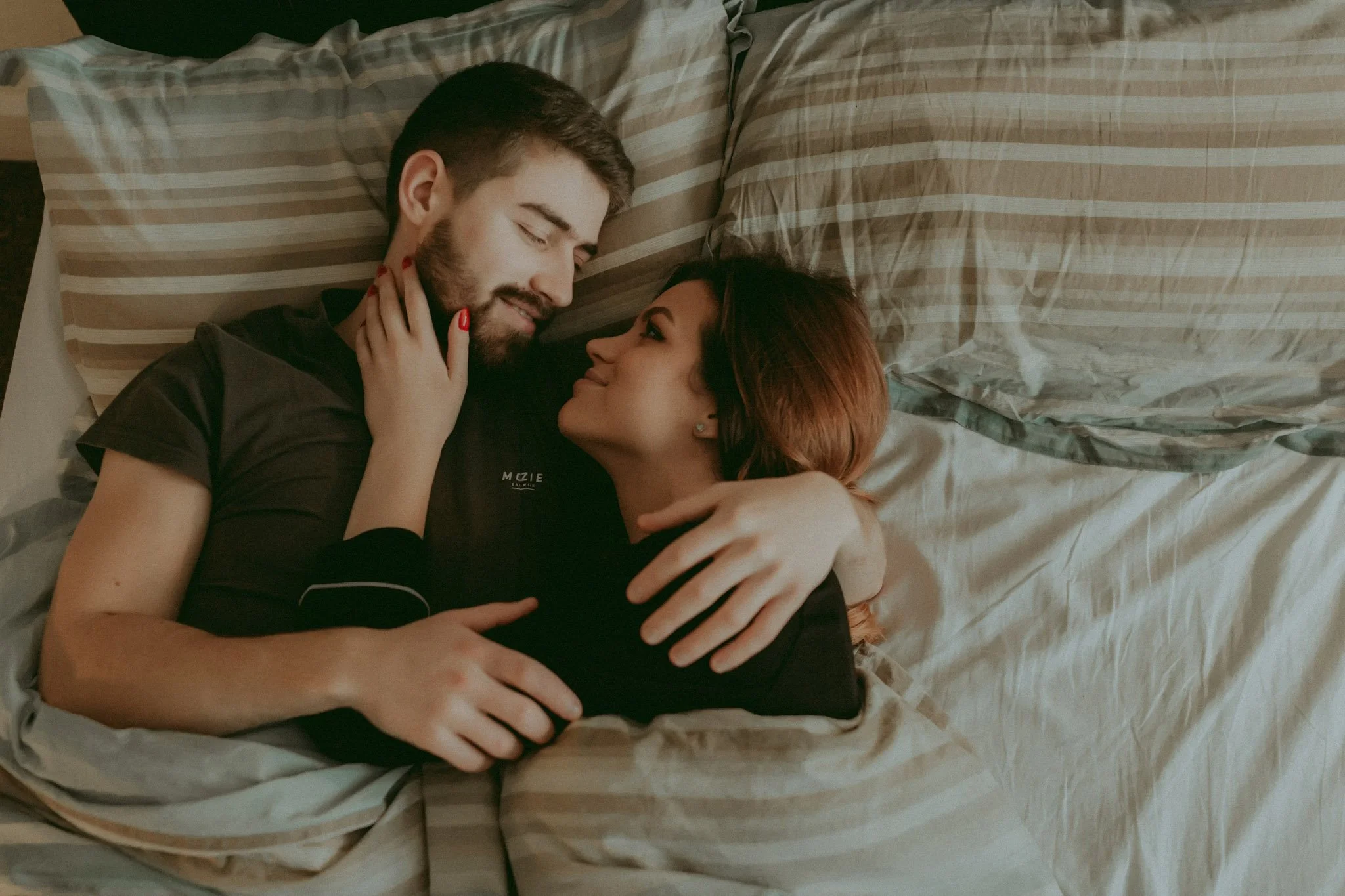 Intimate couple session in bedroom