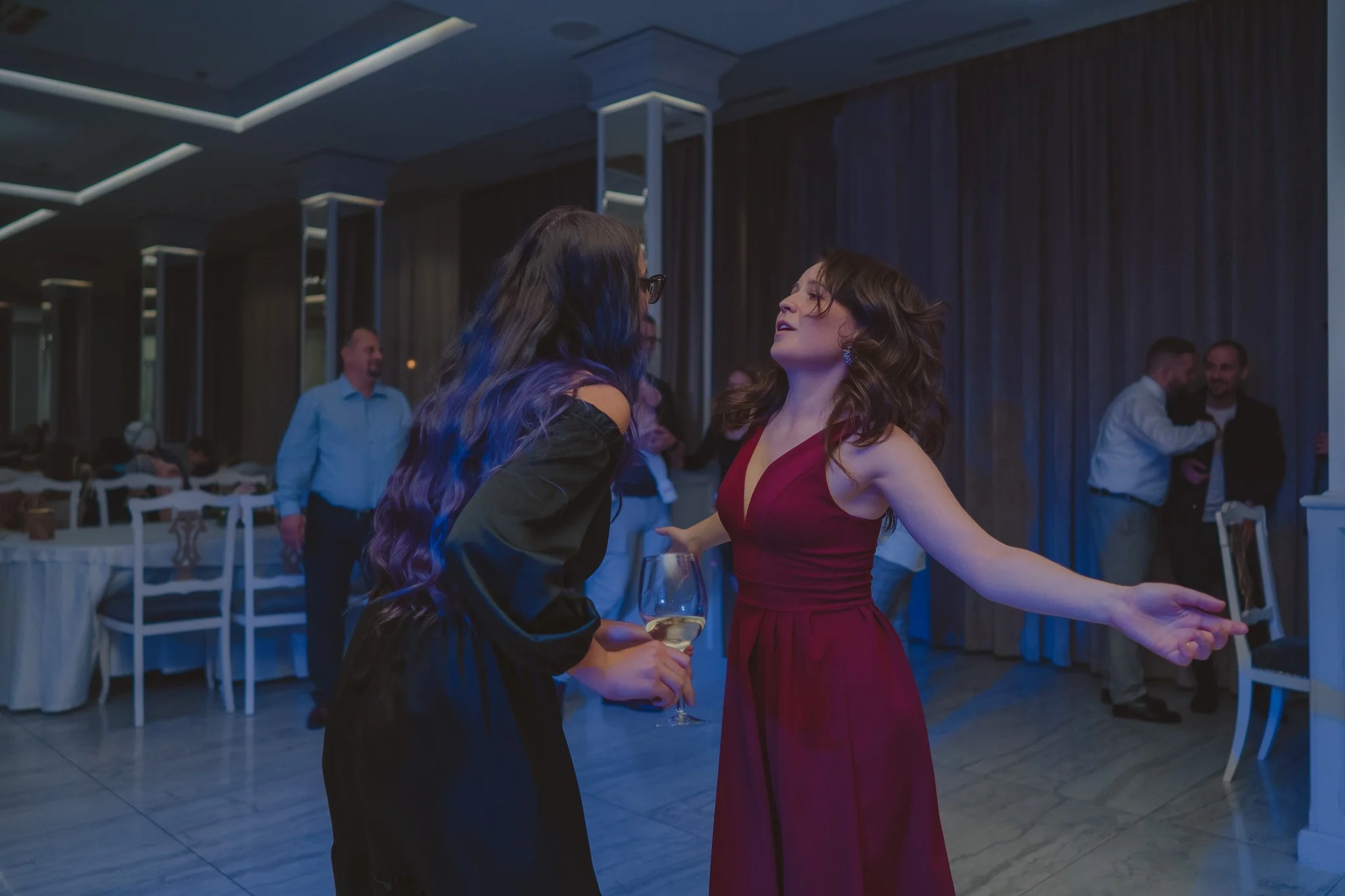 Guests having fun on the dance floor during a Christening party at Hotel Royal Classic, Cluj-Napoca, Romania