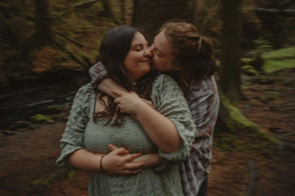 Long exposure portrait of a queer couple, in Snake Woodland