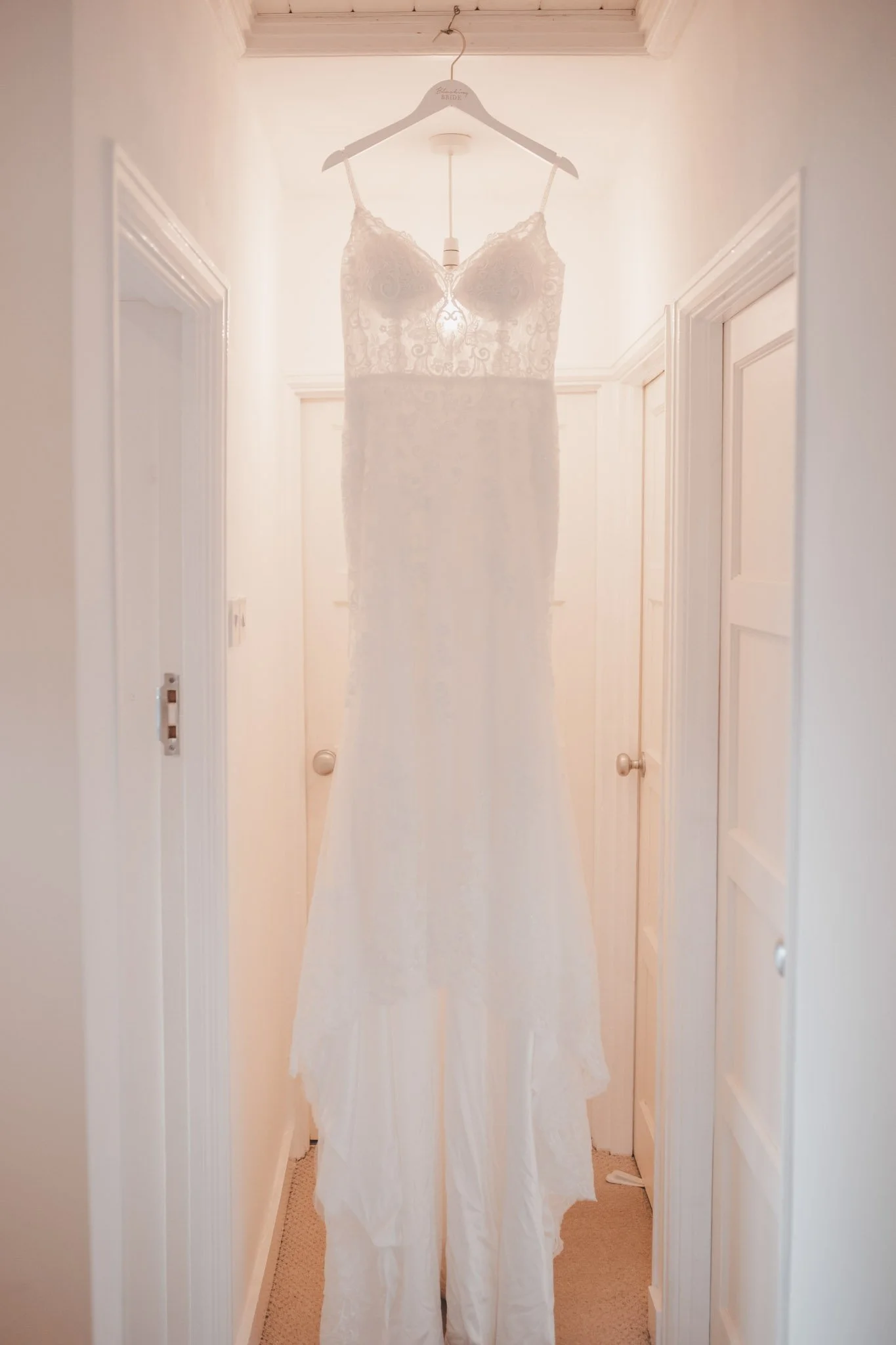 Wedding dress photographed at brides house