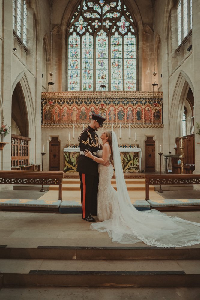 Bride and Groom in front of the altar at their wedding in Basingstoke, UK