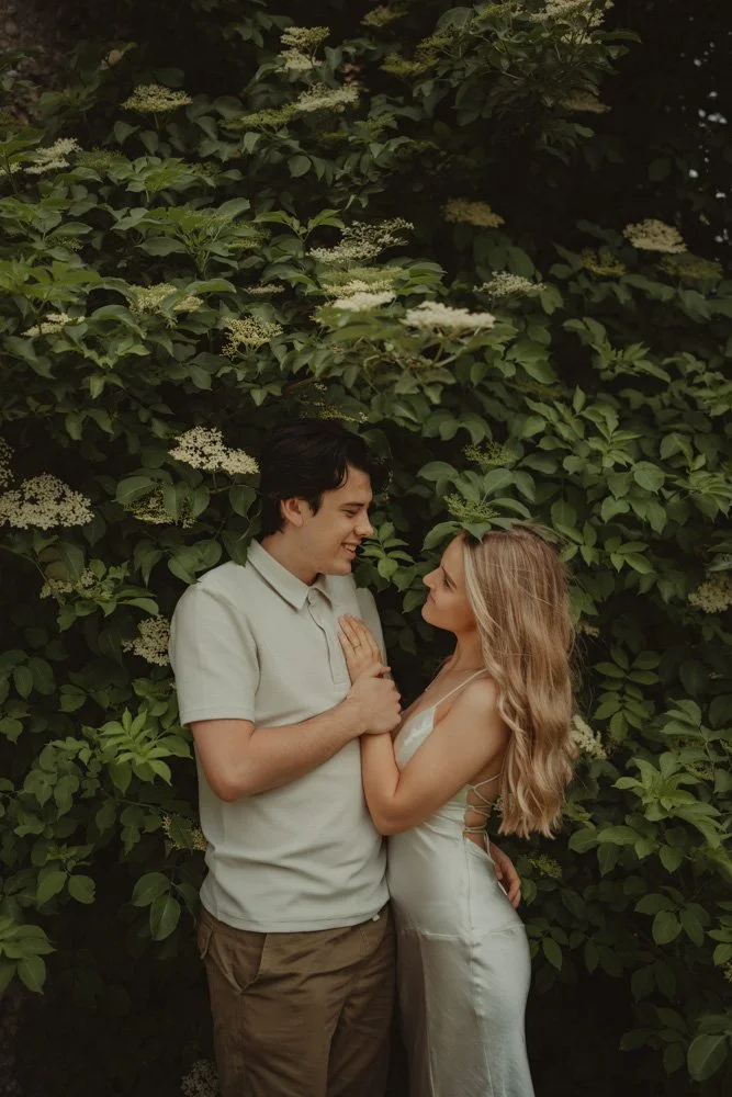 Young couple looking at each other during their pre-wedding photoshoot