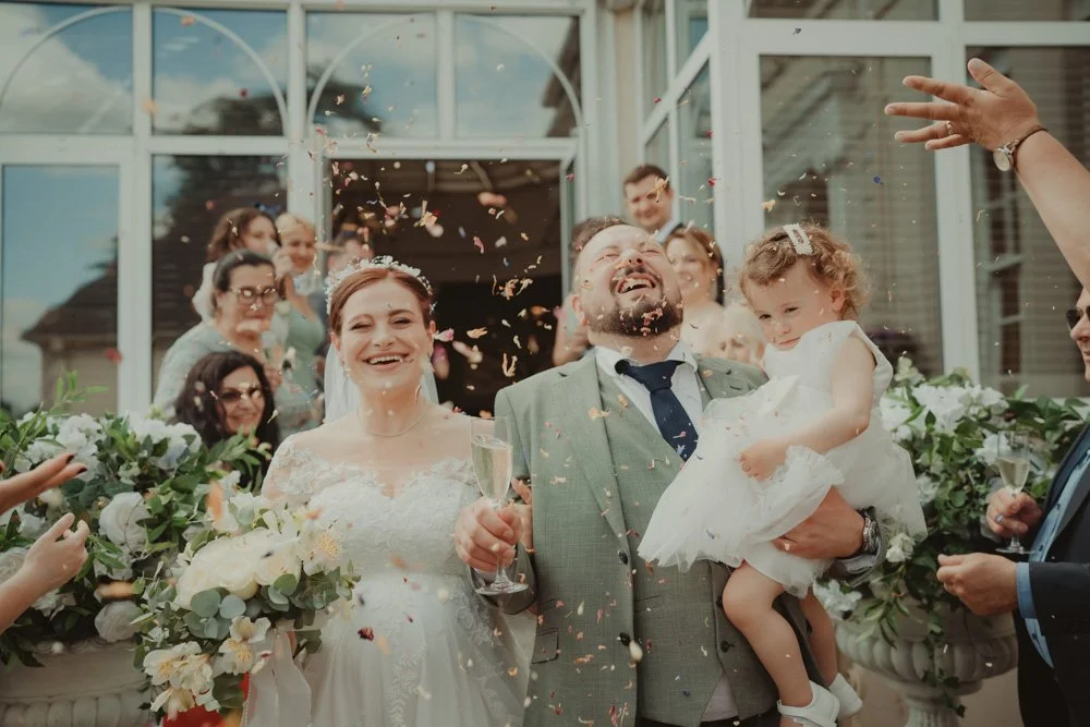 Confetti exit during a wedding at 
Brockencote Hall Hotel, Kidderminster