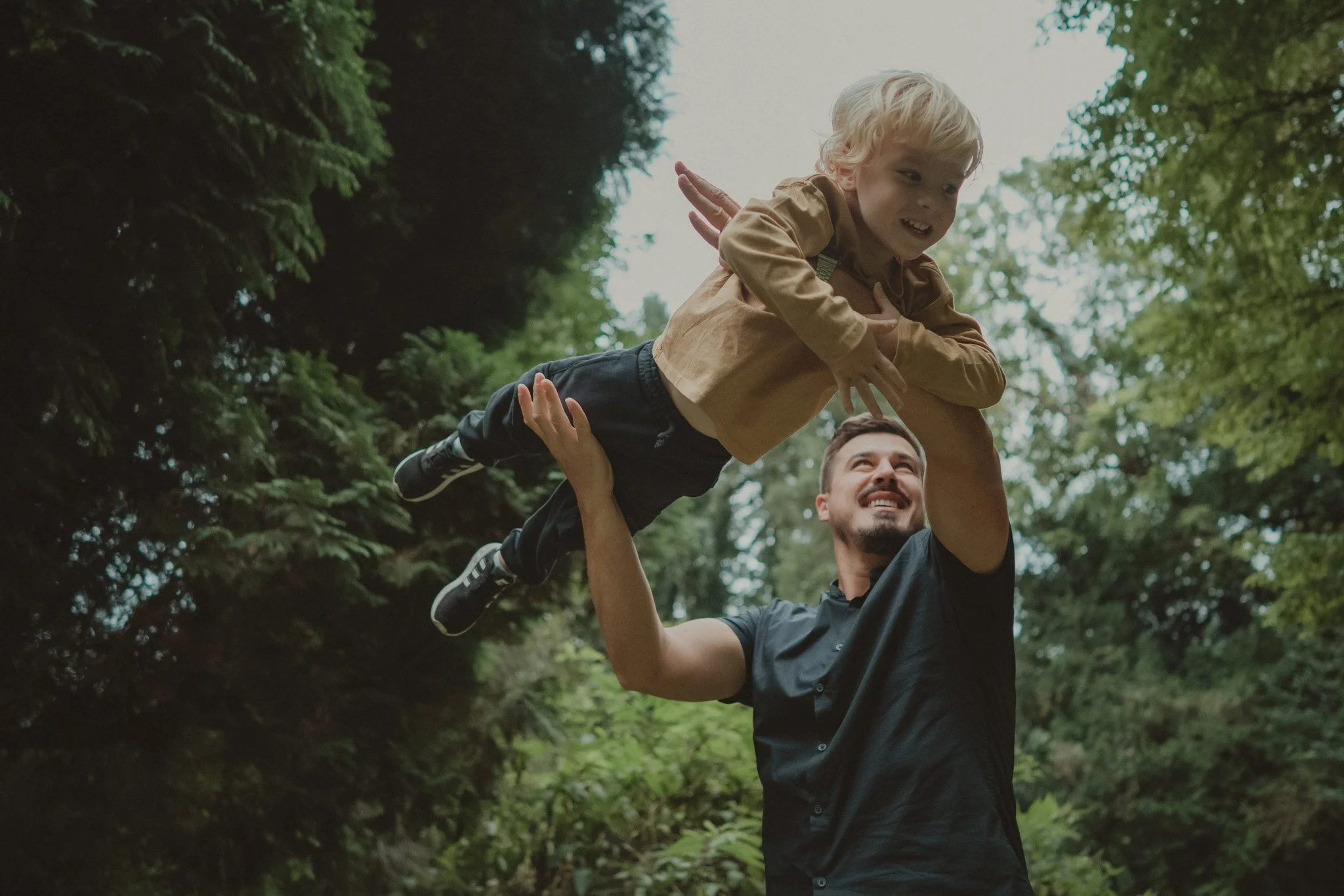 Father playing with his little boy 