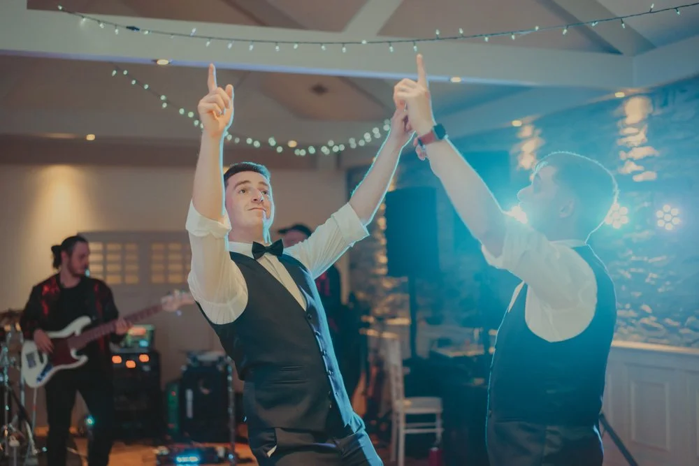Man dancing on the dancefloor at a wedding in Wales