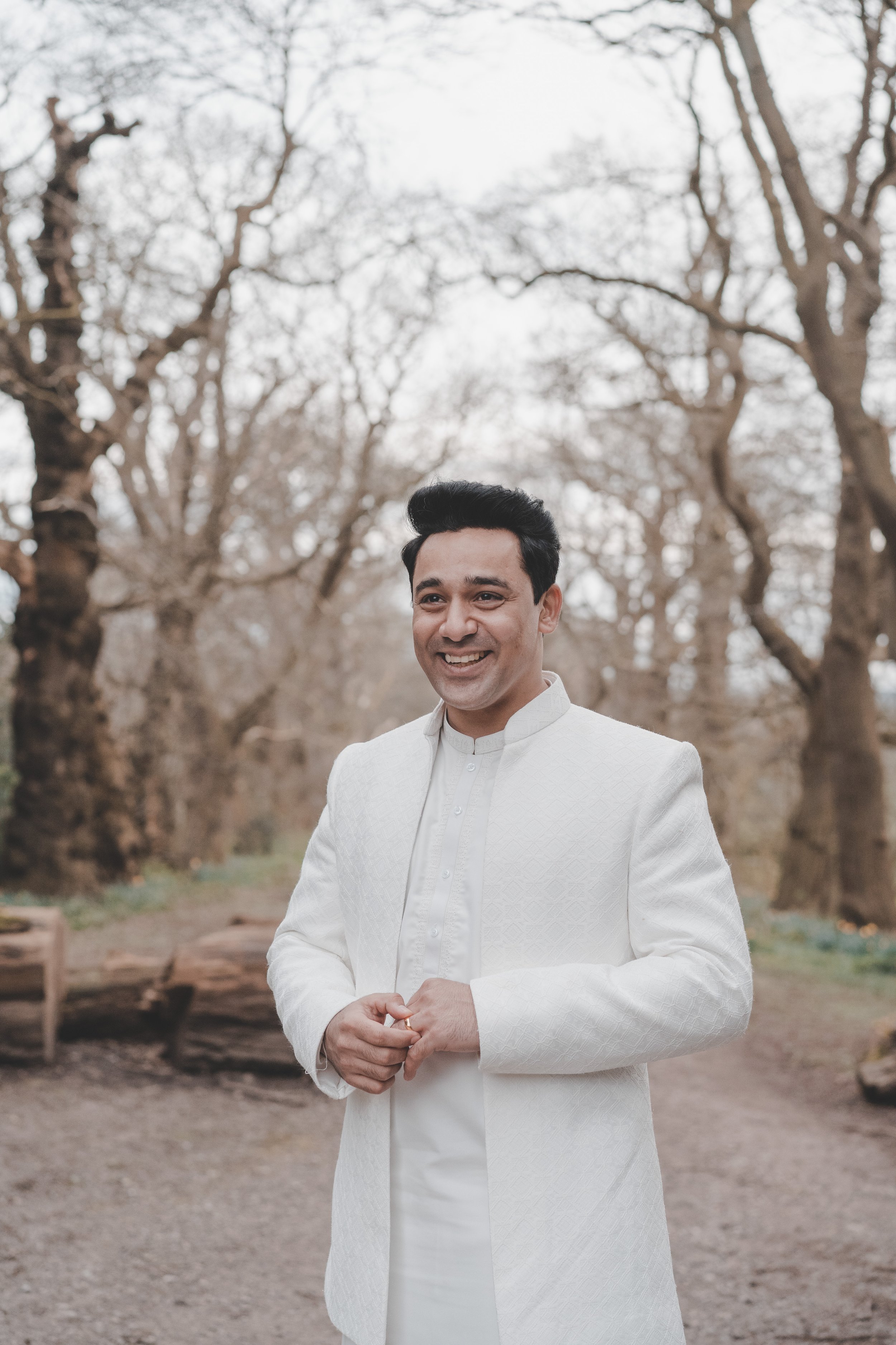 Portrait of groom dressed in islamic white traditional clothes for a Nikah ceremony